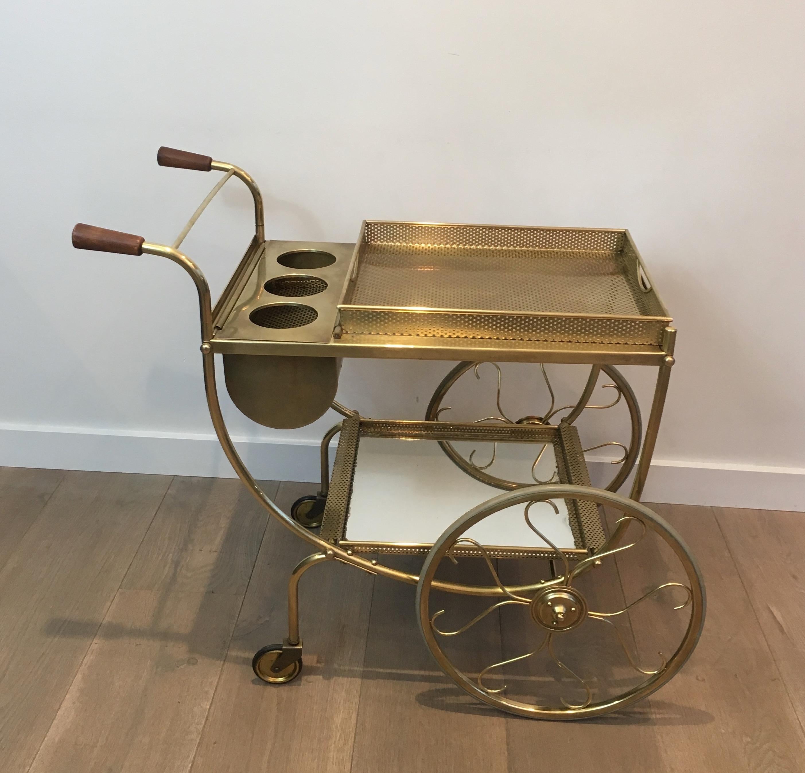 This design drinks trolley is made of brass with a removable top tray. This is a Sweedish work by Josef Frank for Svenskt Tenn. Circa 1950