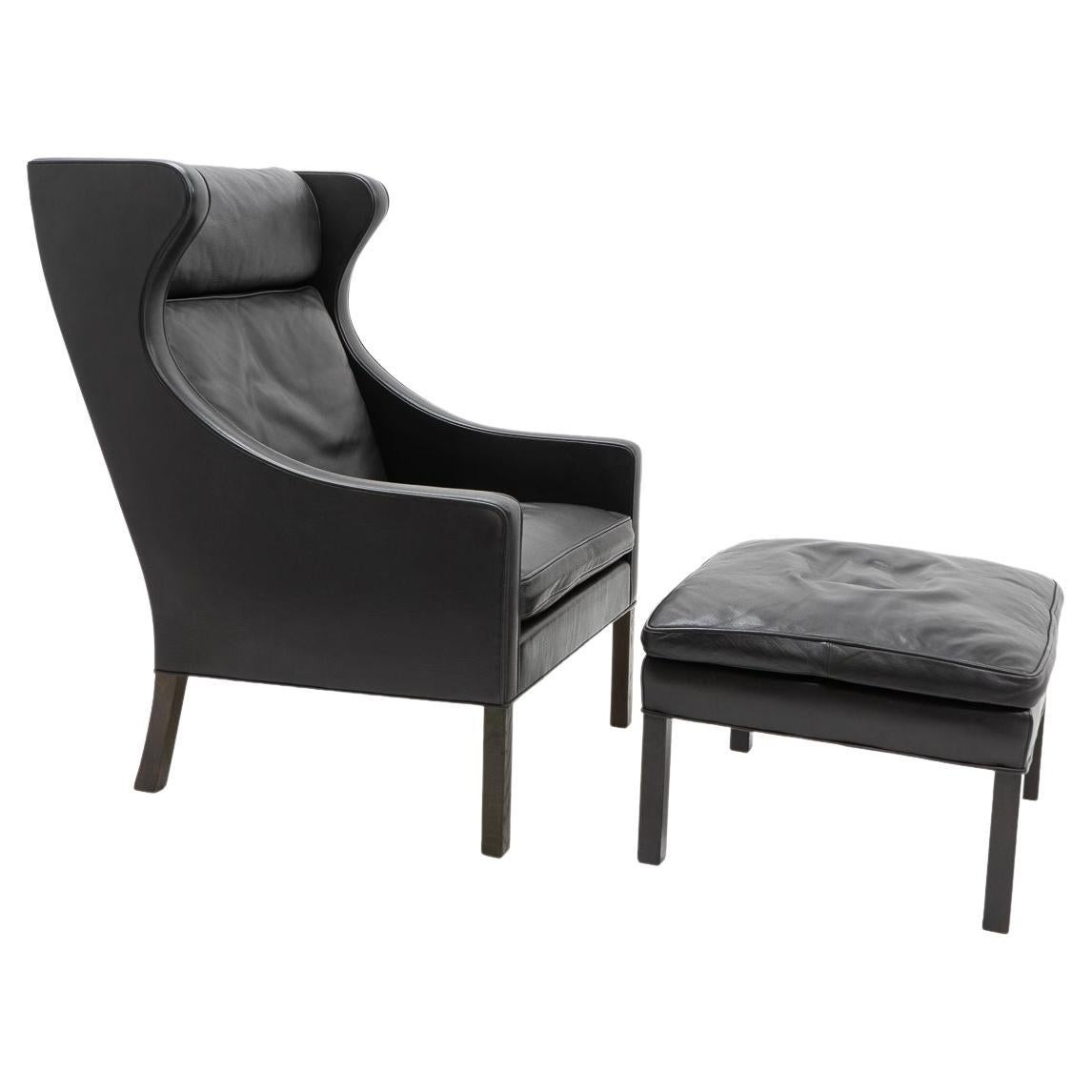 Design Classic Black Leather Wingchair and Footstool by Borge Mogensen, 1960s For Sale