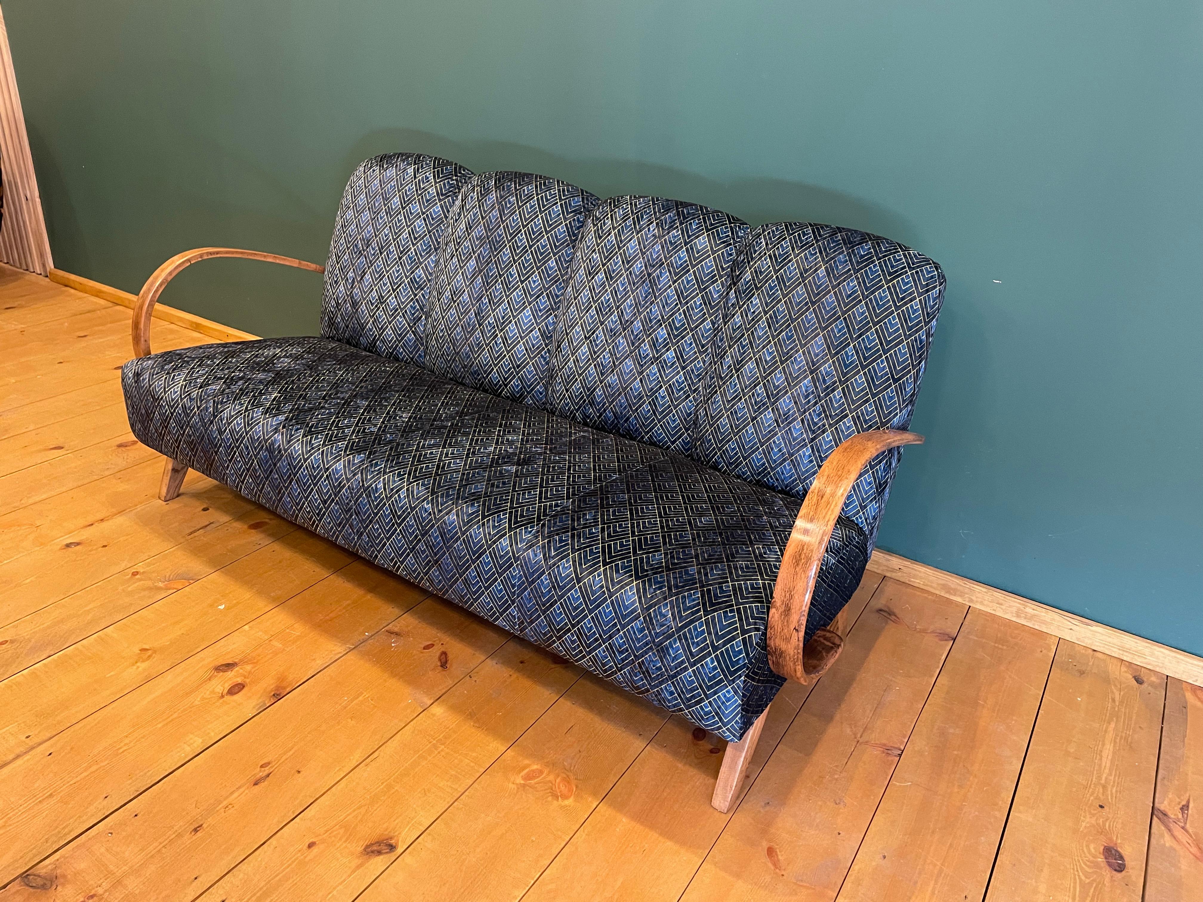 Art Deco couch J.Halabal from 1940
We present designer sofa by J.Halabala, It was made in the Czech Republic in the Up Zavud factory
It has been given a complex manual renovation, the whole upholstery has been replaced with a new one. Wooden parts