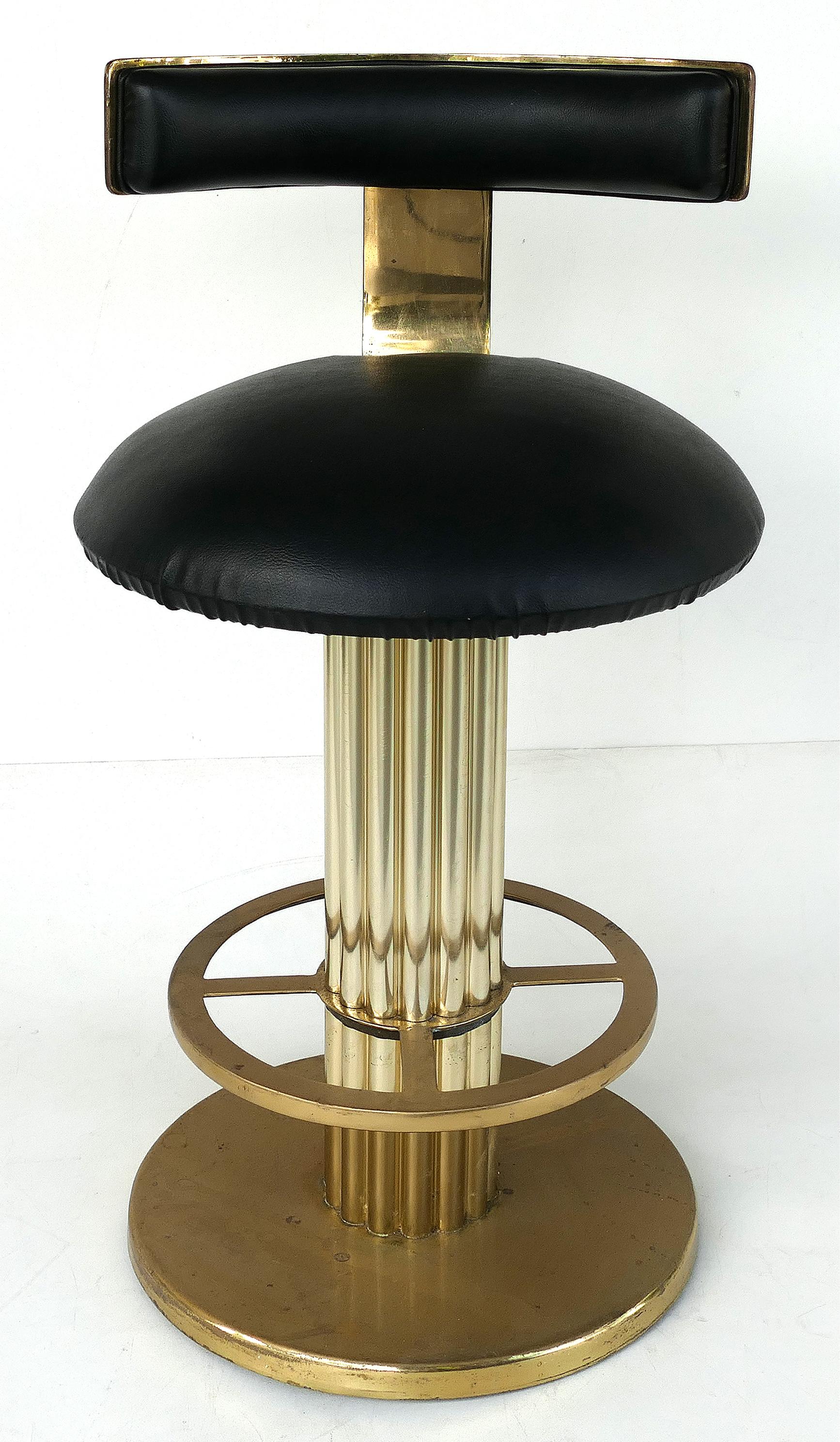 Design For Leisure Ltd leather and brass counter stools, set of 3 swivel stools

Offered for sale is a set of three Design For Leisure Ltd. swivel bar stools with brass frames and black leather upholstered seats and backs. Design For Leisure is