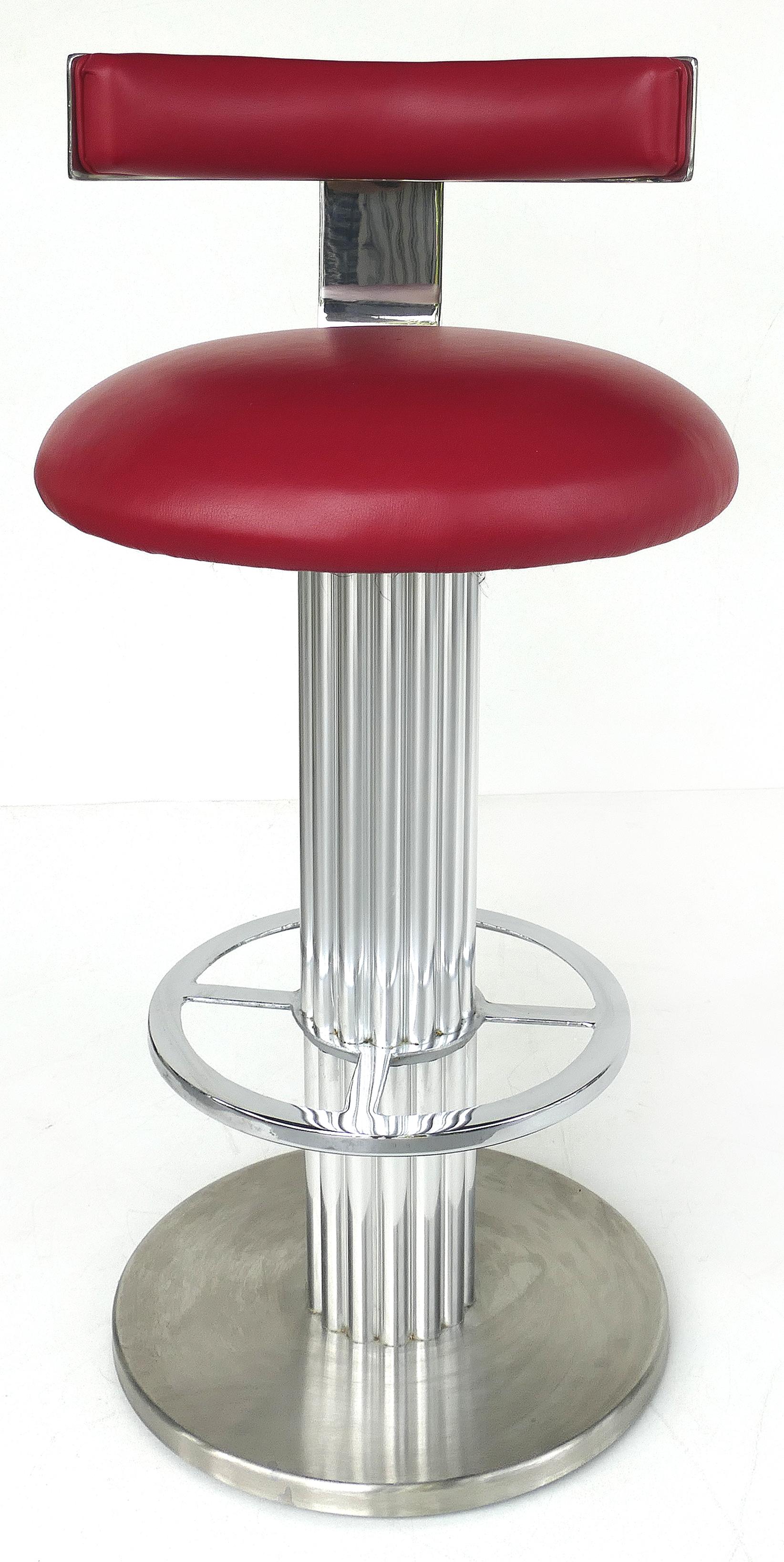 Design for Leisure Ltd. Stainless and leather bar stools, set of 4

Offered for sale is a set of four Design for Leisure Ltd. swivel bar stools with stainless steel frames and red leather upholstered seats. Design for Leisure is known for its