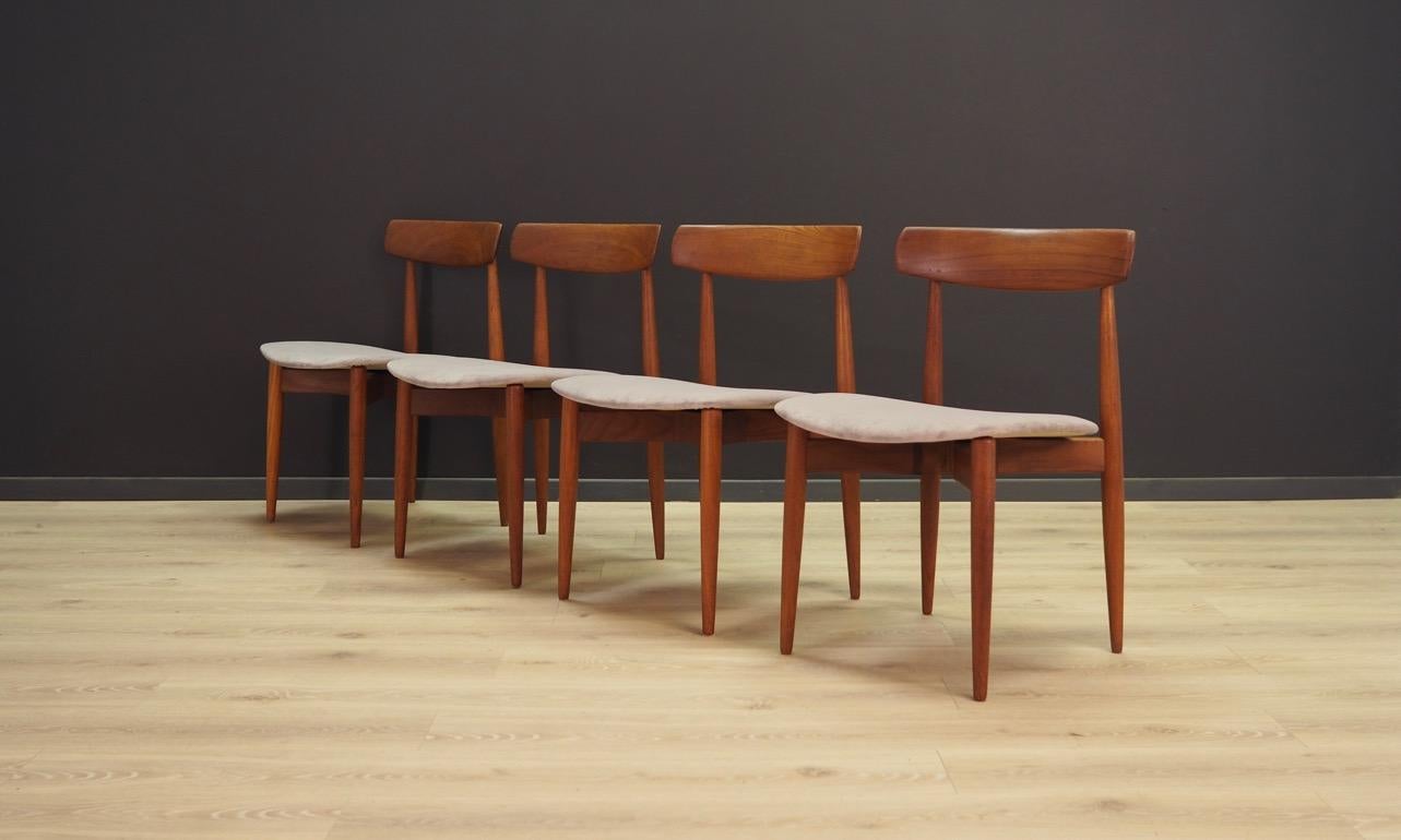 Set of four minimalistic chairs of the 1960s-1970s. Beautiful postwar Danish modern style chairs designed by Henry Walter Klein. Characterizes in well proportioned, and crafted forms. Construction made of teak wood. Velour upholstery in grey.