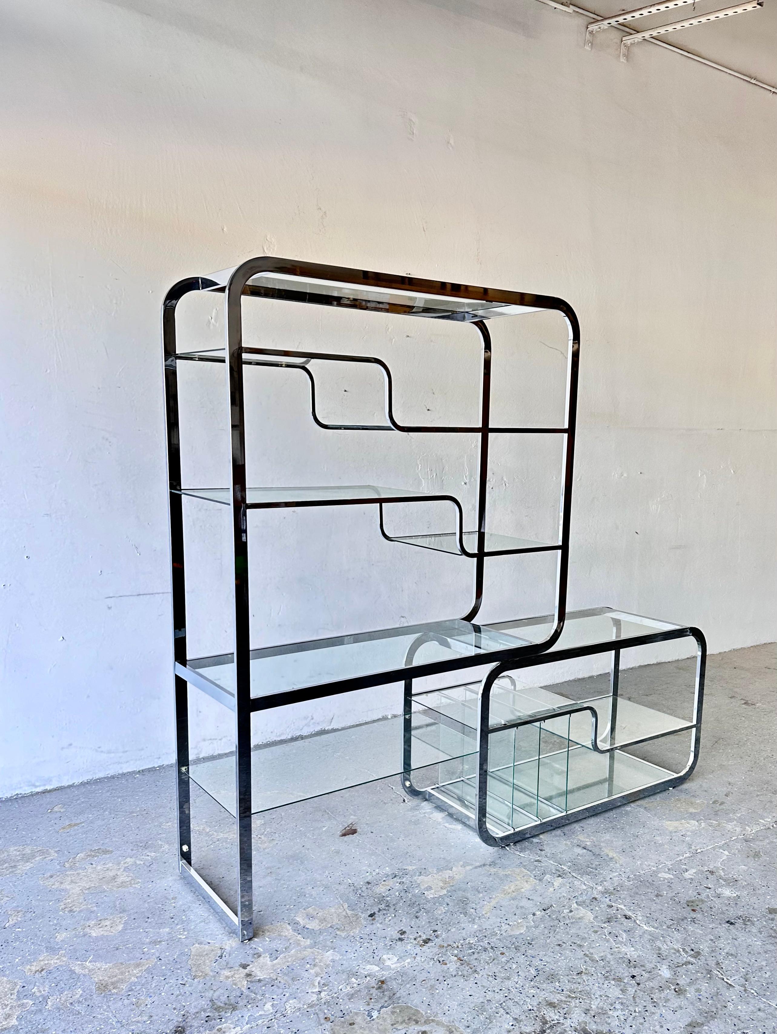 Design Institute Mid Century Chrome Cantilever Etagere Room Divider Display Shelf in the style of  Milo Baughman 

This piece is often attributed to Milo Baughman but it is not. It is by Design Institute. This magnificent Mid Century /Post-Modern