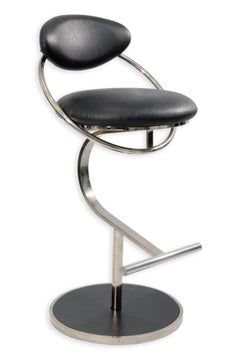 Design Institute America: sgabelli da bar alti in pelle nera e cromo