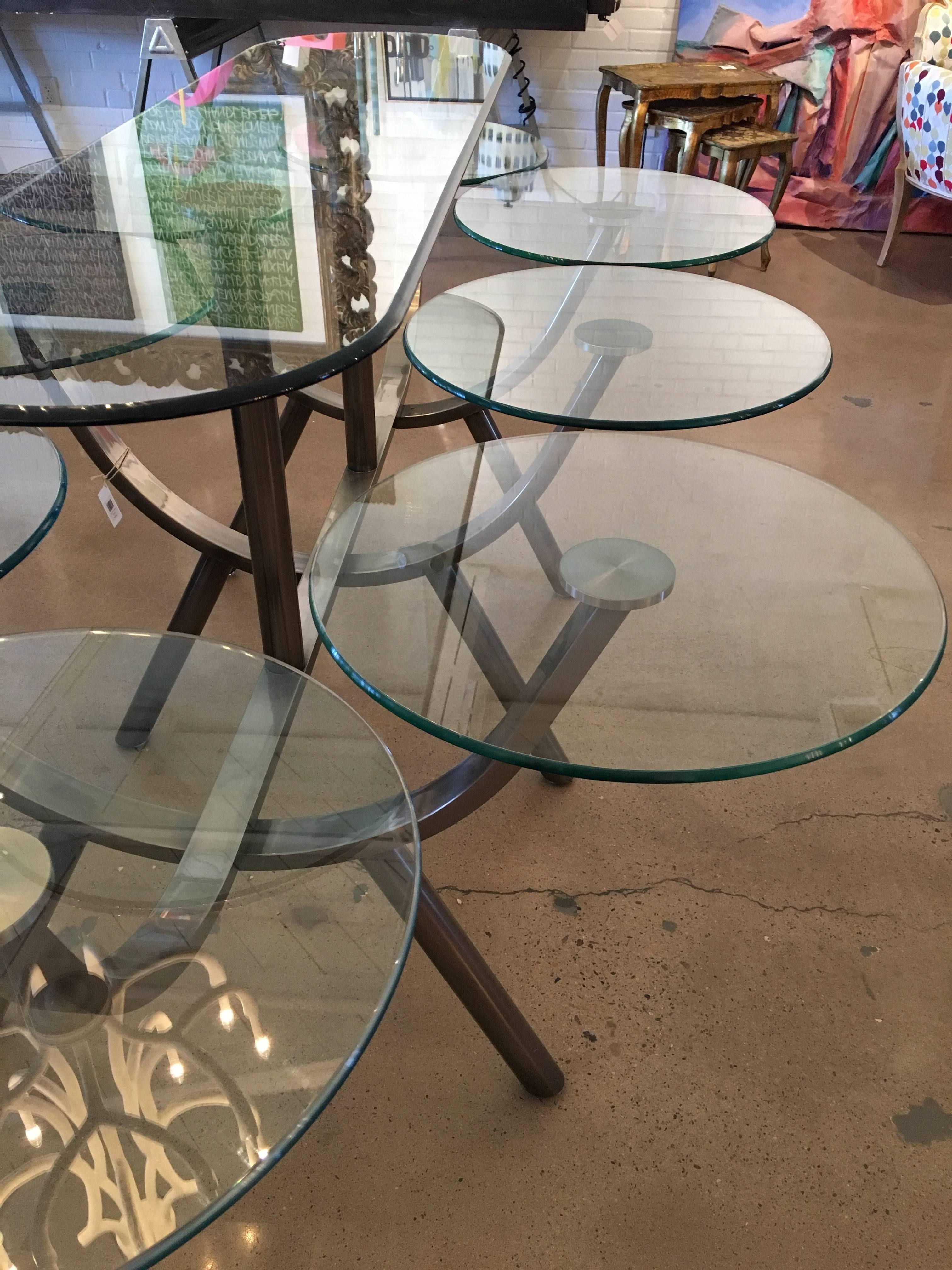 This iconic and amazingly unique dining table is offered here. With a circular place setting for each person, this truly is a dining experience!