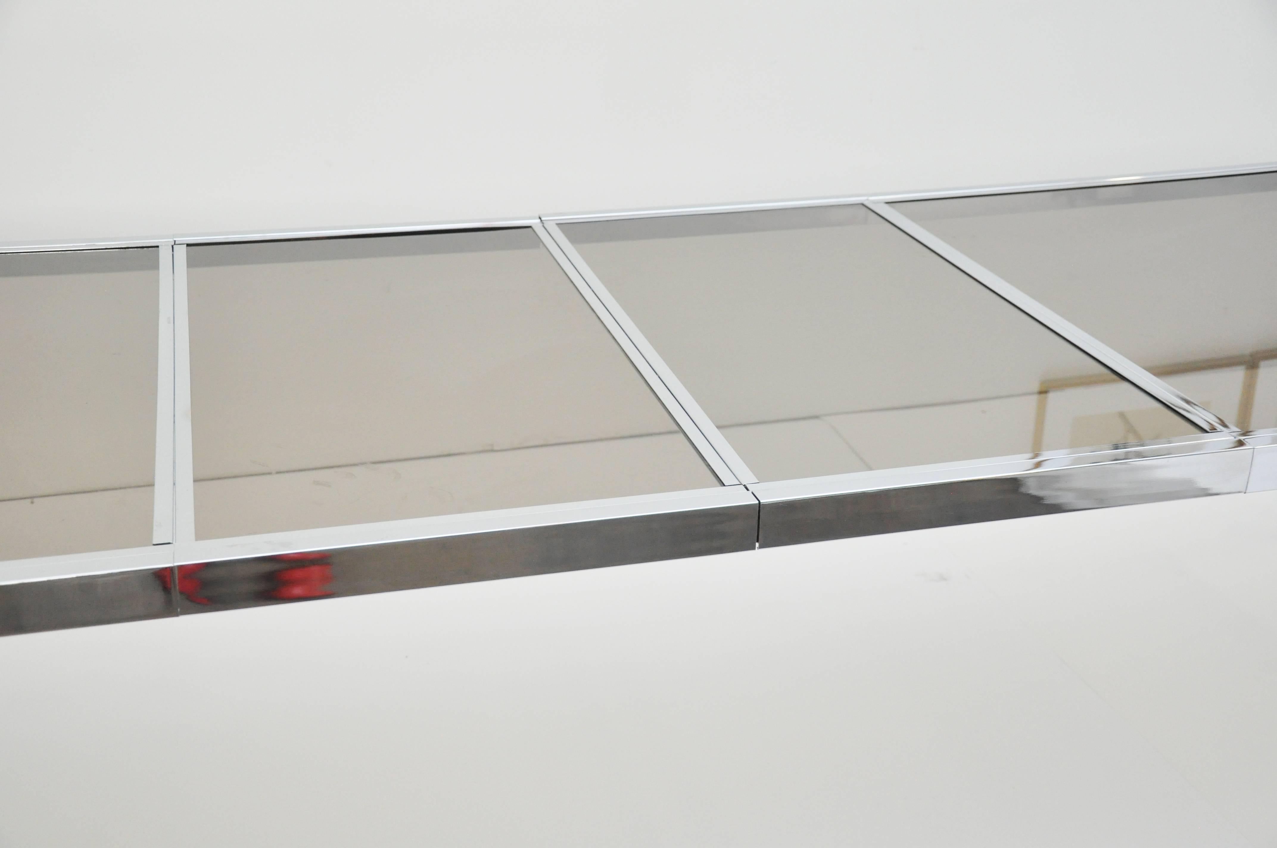Design Institute chrome and glass table has two 20