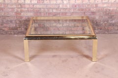 Design Institute of America table basse Hollywood Regency en laiton et verre, 1984