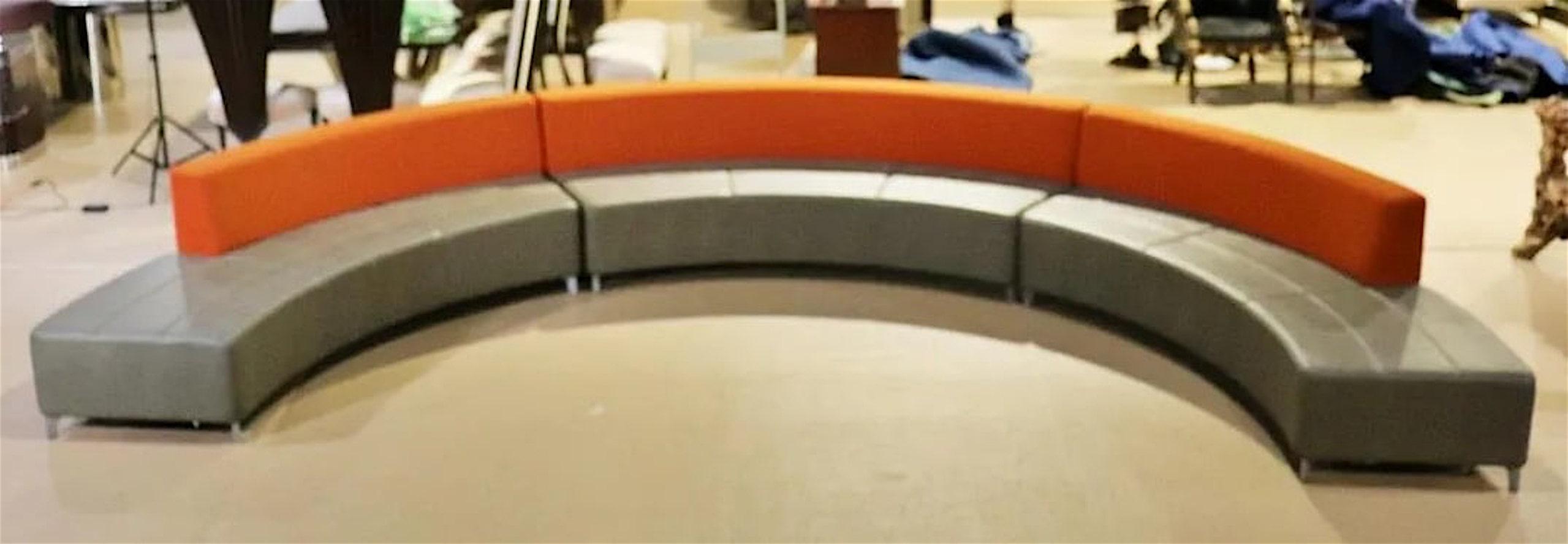 Three piece semi circle sofa made by Design Institute of America. Vinyl seats with aluminum legs. Each piece measures 99