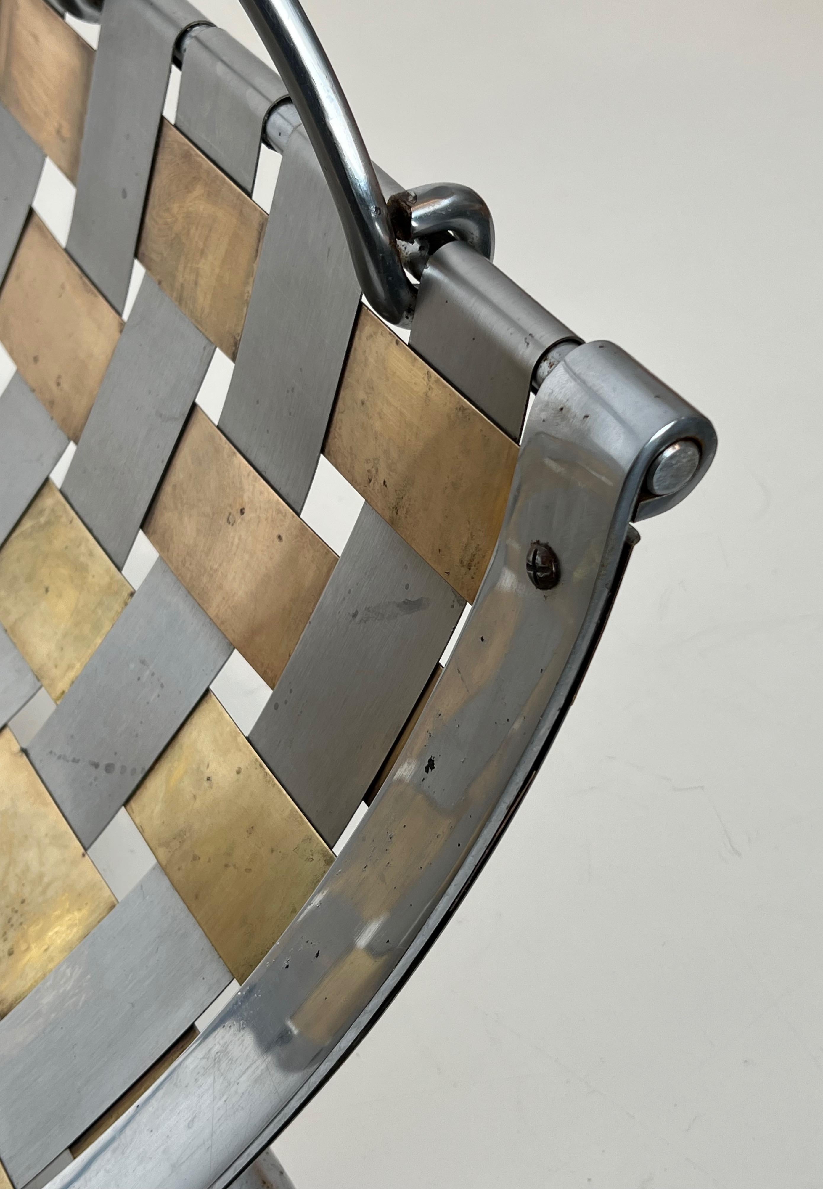 Design logs holder made of intersecting brass and chrome strips. Circa 1970 For Sale 11