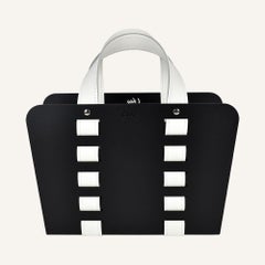 Revistero de diseño L-BAG - Acero y cuero regenerado