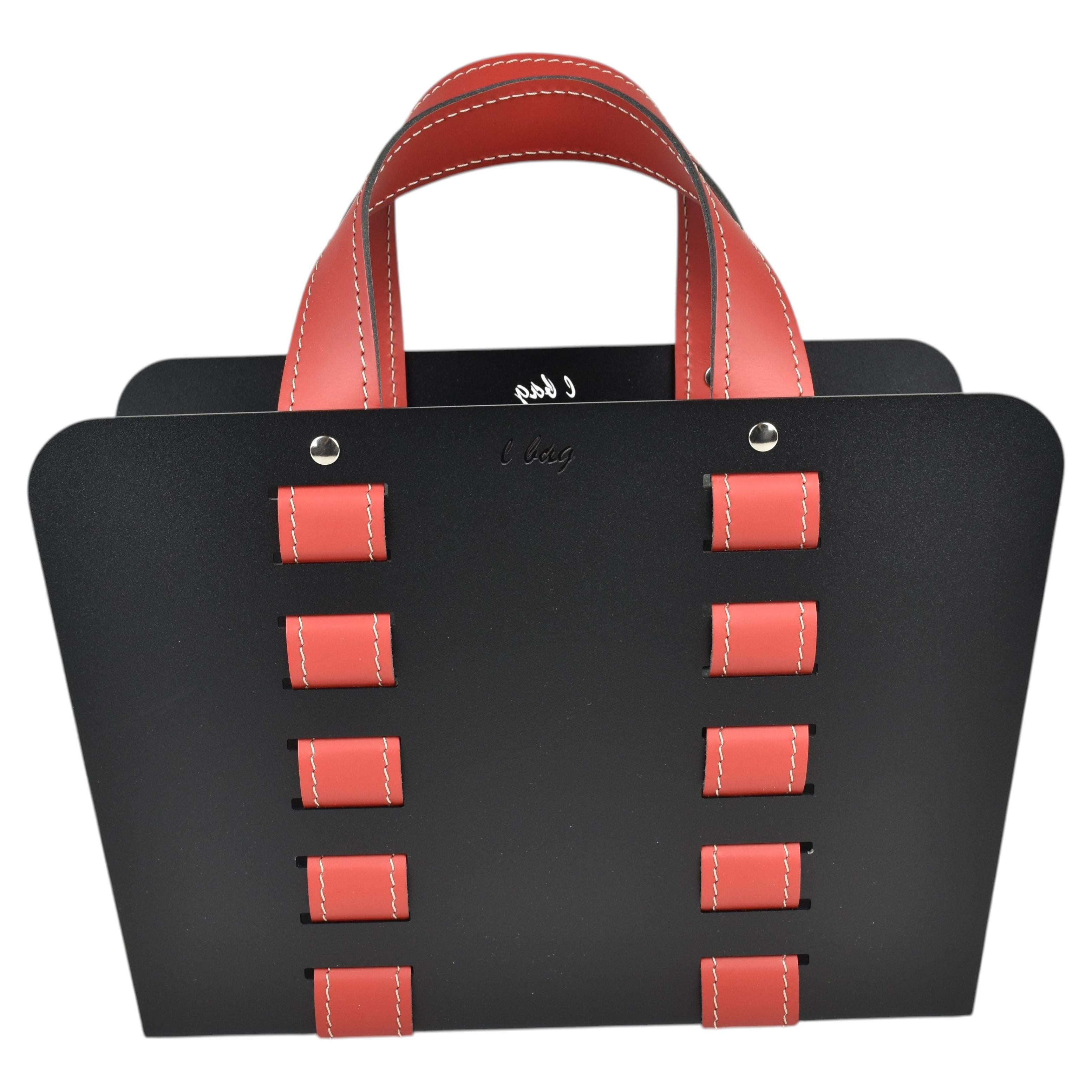 Revistero de diseño L-BAG - Acero y cuero regenerado