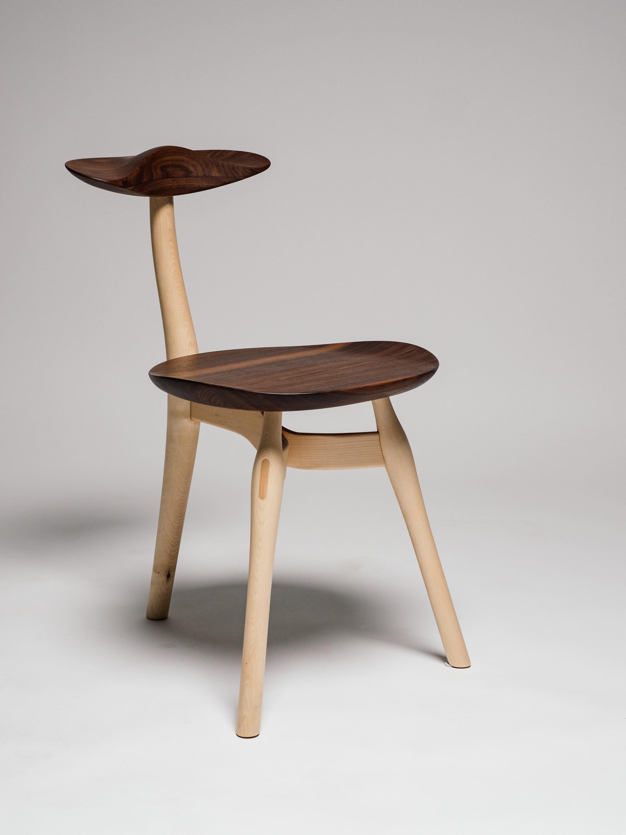 Design Philip Von Hase Ergonomic sitting sculpture chair oak and walnut. 

Phillip Von Hase is a cabinet maker educated in Hanover Germany and now located in Bergen Norway. He create furniture with a passion for wood and nature and with a