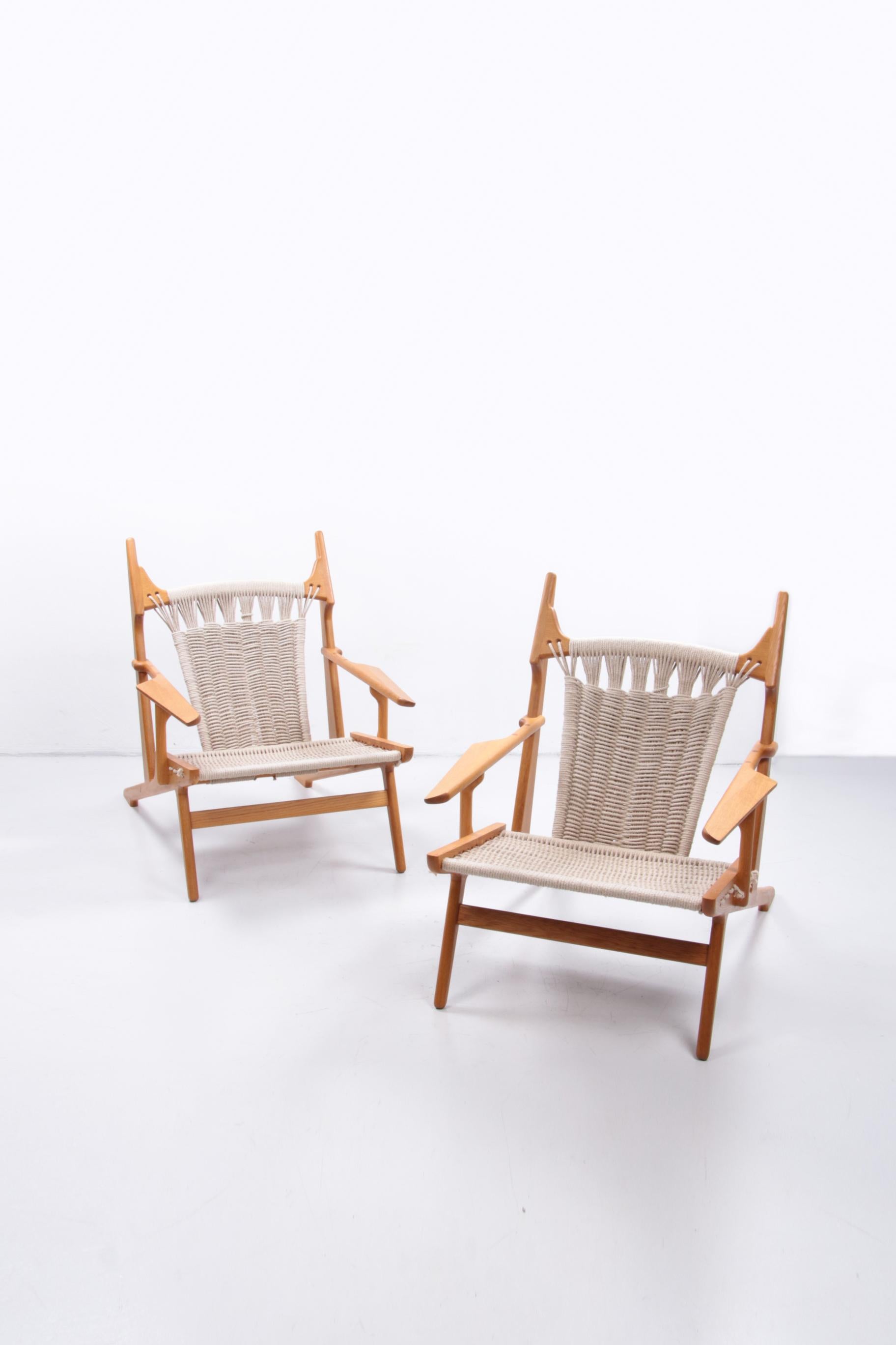 Beautiful Danish set of relax chairs, beautiful modern design by Martin Godsk woodworker.

Beautiful in oak with handmade thick wool rope braided back and seat.

This is model MG35 Lounge chair.

This model is no longer made and only about 10