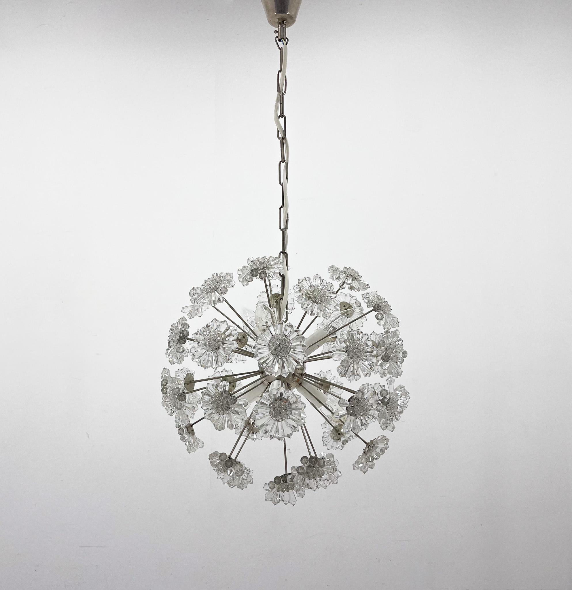 Beautiful crytal and chrom chandelier from the 1970's, produced by famous Preciosa. The chandelier is in original very good condition, only the sockets have been replaced. 
Bulbs: 6x E14. 
US wiring compatible.