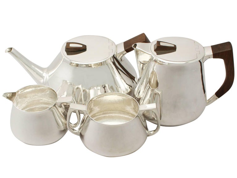 An exceptional, fine and impressive vintage Elizabeth II English sterling silver four-piece tea and coffee set and matching tray; an addition to our silver teaware collection

This exceptional vintage Elizabeth II sterling silver four piece tea