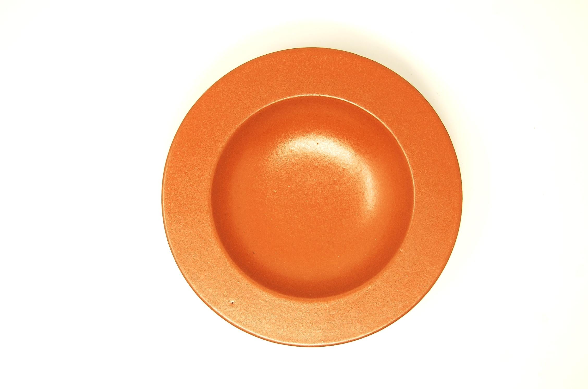 Low pottery bowl, designed by Lee Rosen for Design Technics, circa 1974. Bowl measures 8 3/4