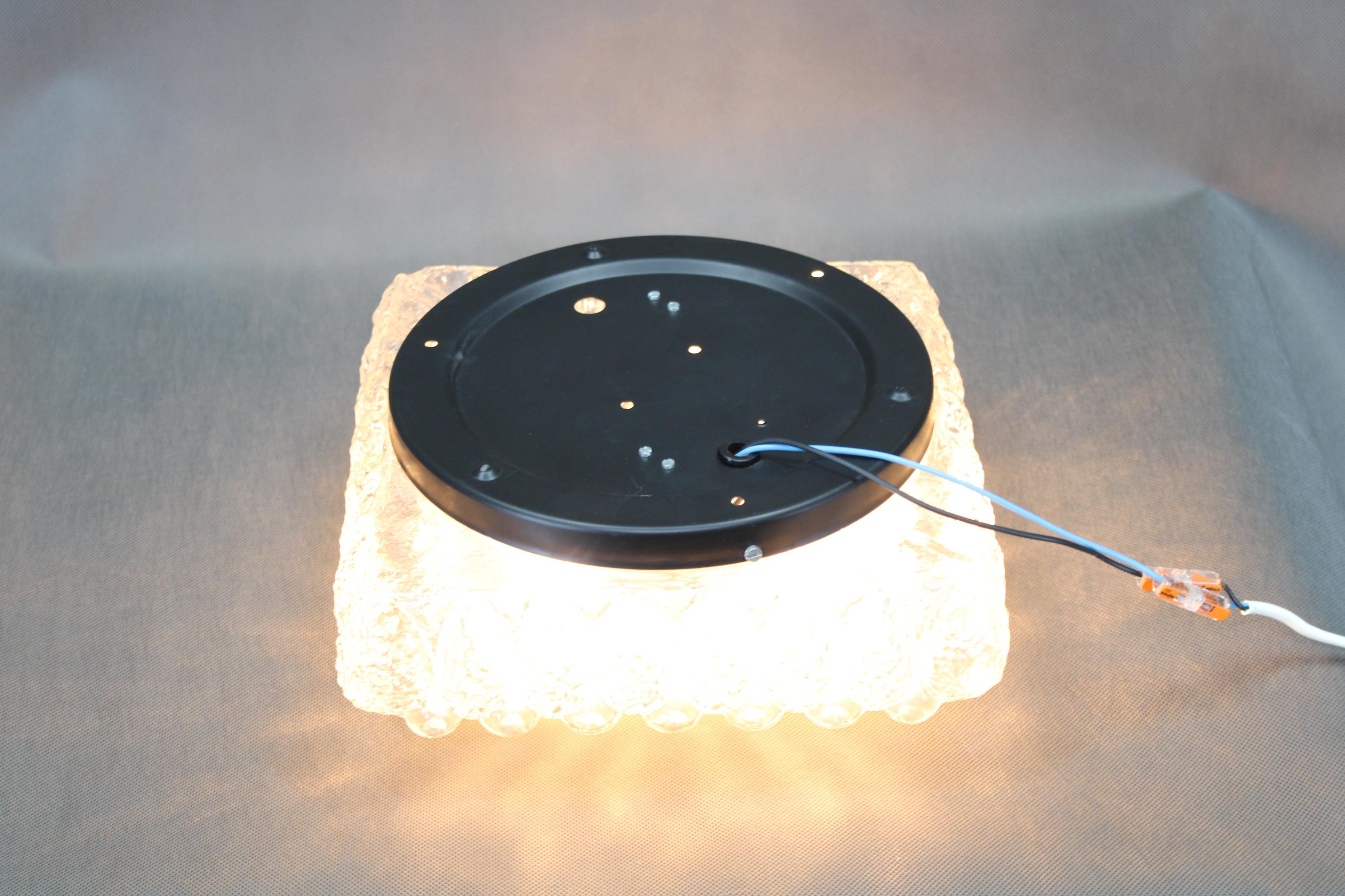 Vintage wall/ceiling lamp, made in the 1970's, in former Czechoslovakia.
Made of metal and glass.
Repolished, cleaned, shows a few minor signs of use, overall in great condition.
Fully functional, newly installed cables.