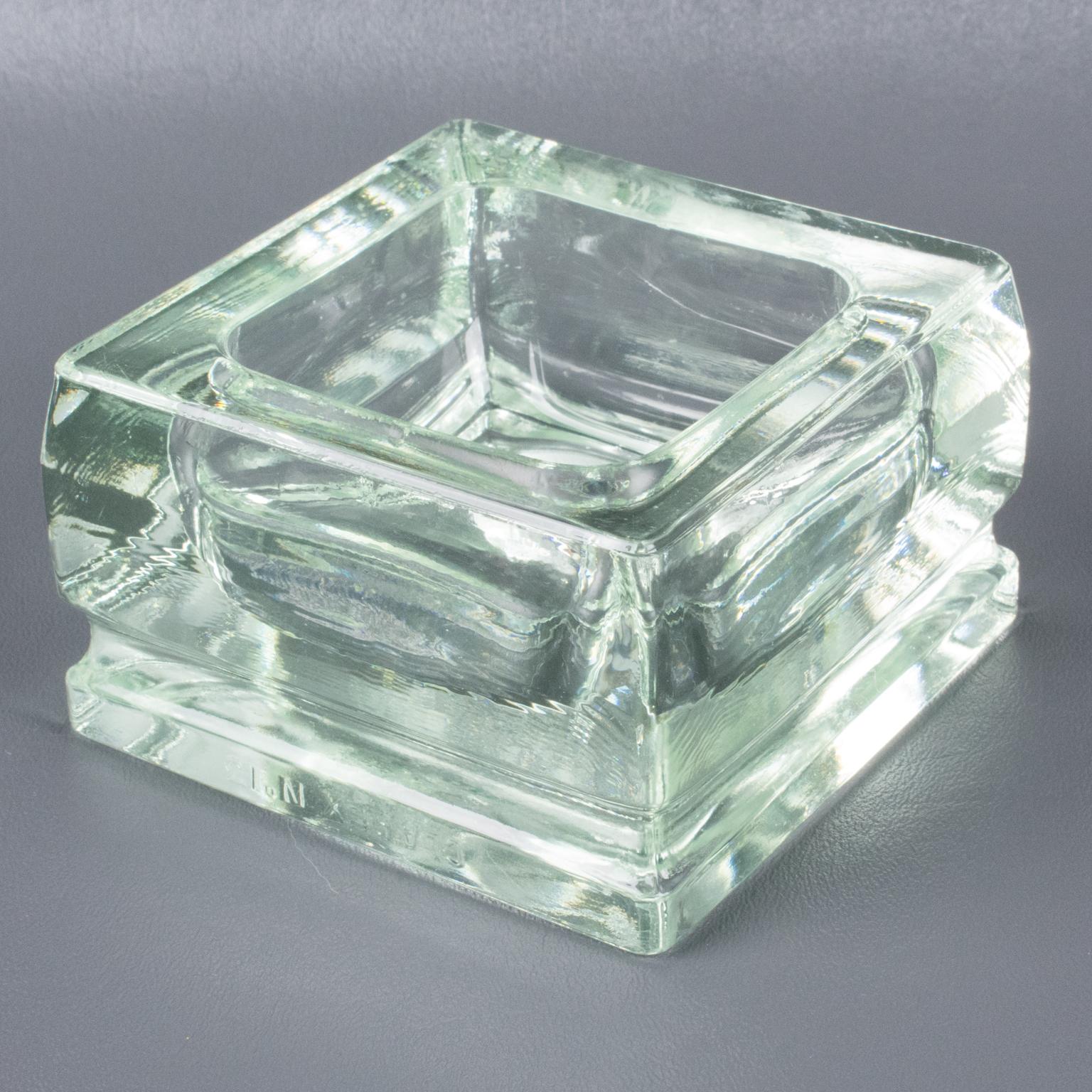 Industrial thick molded glass desktop accessory catchall, or desk tidy or ashtray manufactured by Lumax, France. Original design by Le Corbusier. Engraved marking on the side reads 