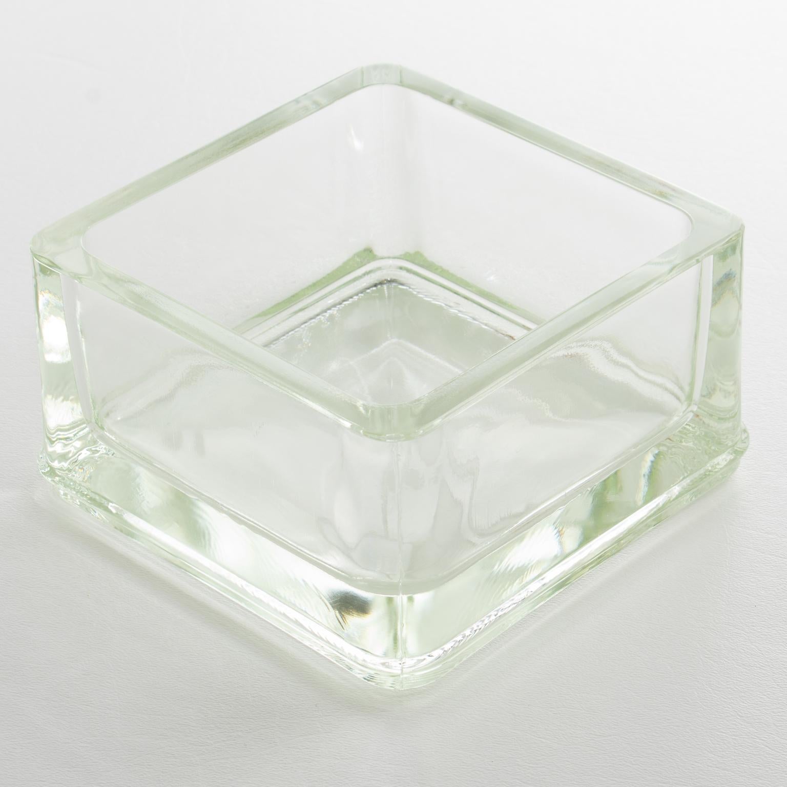 Industrial thick molded glass desktop accessory (desk tidy, ashtray, or catchall) manufactured by Lumax, France. Original design by Le Corbusier. 
The vide poche is in excellent condition, with no pronounced signs of wear.
Measurements: 5.94 in wide