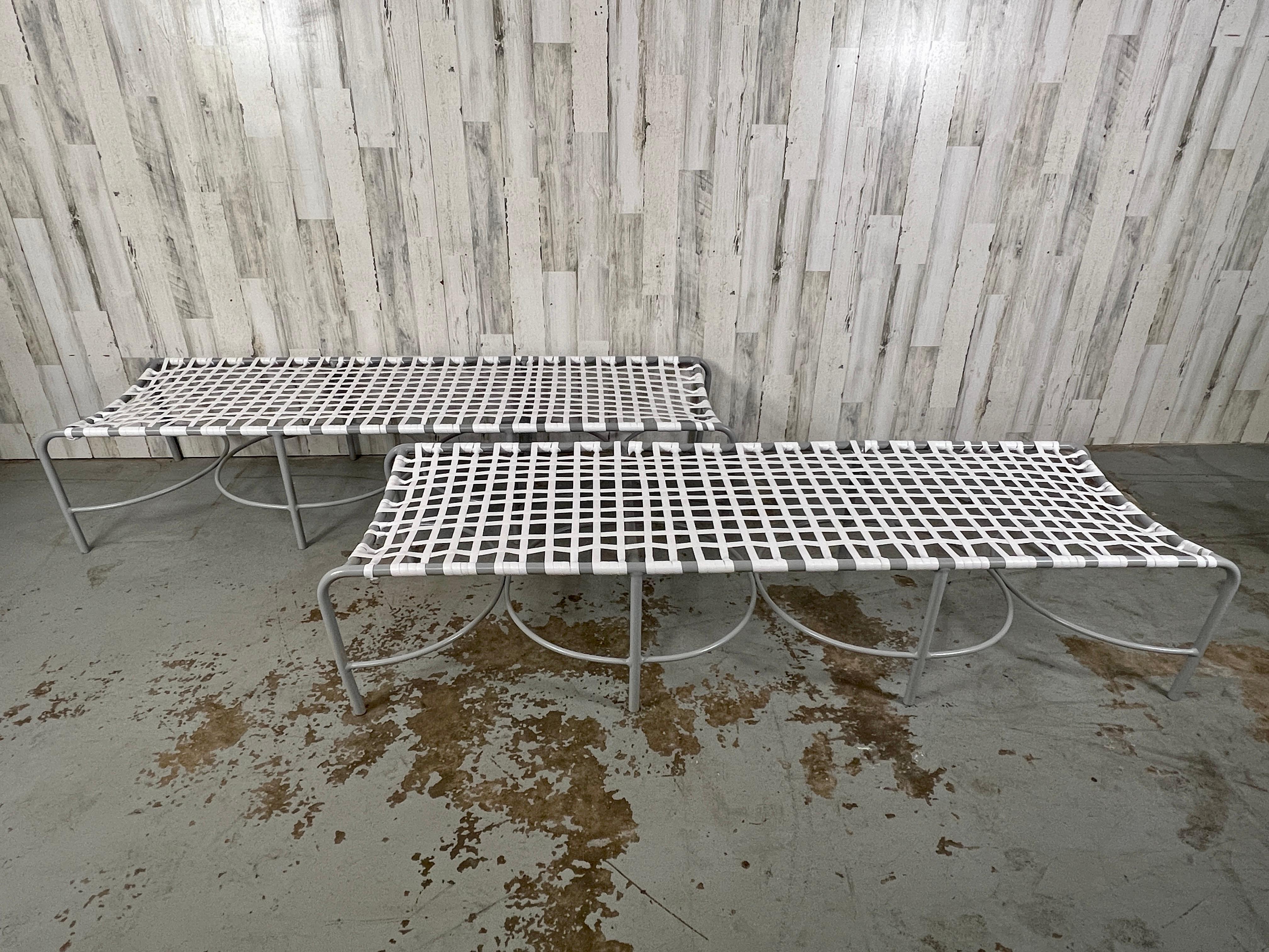 Hard to fend these rare benches.Designed by Tadao Inouye, Kantan Aluminum benches exemplifies the breezy spirit of patio life.   
The Japanese designer created his pivotal mid-century collection for Brown Jordan in 1956 using the latest lightweight