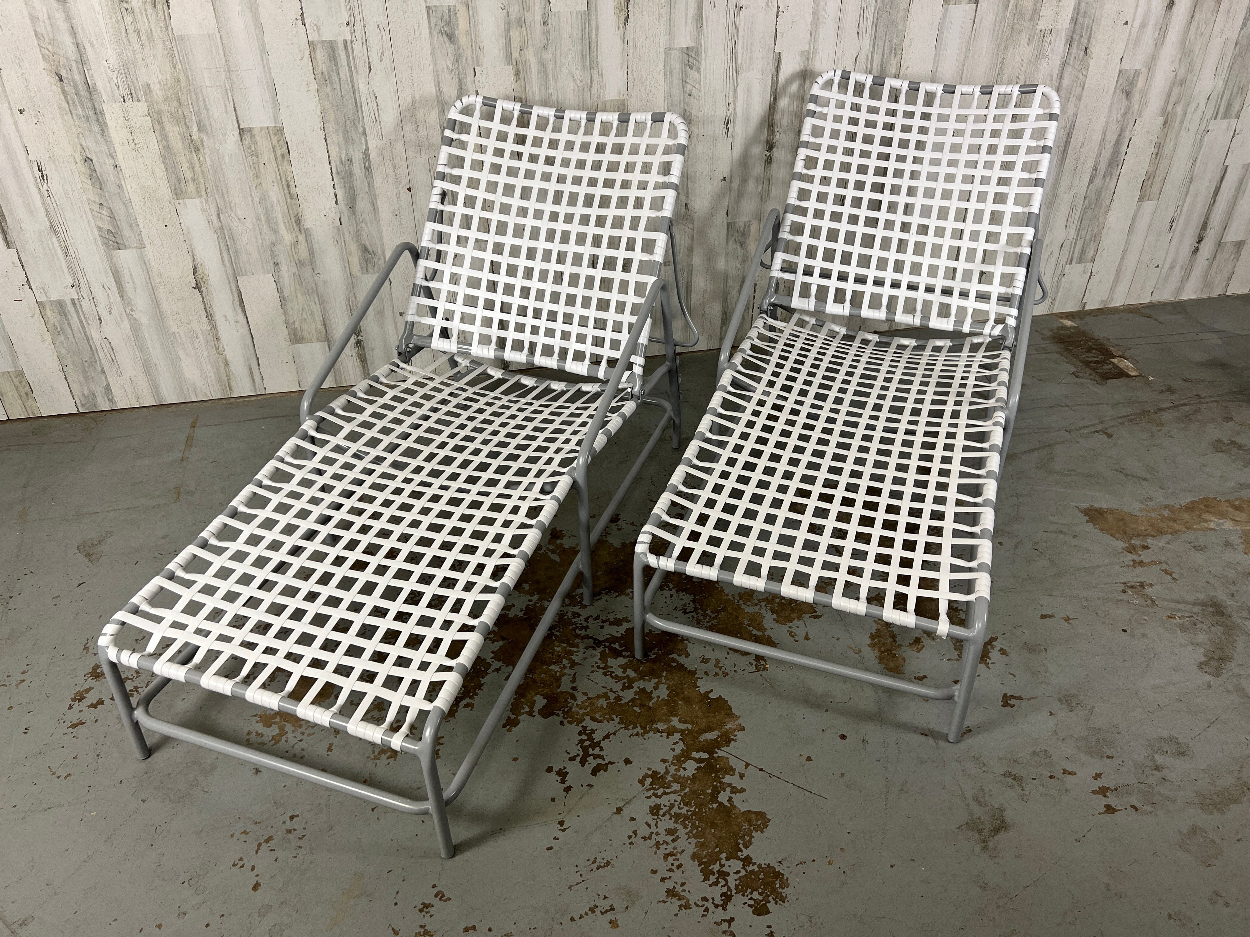 Designed by Tadao Inouye, Kantan Aluminum exemplifies the breezy spirit of patio life.  The frame is newly powder coated in Gray with new white lacing.                                                                                                  