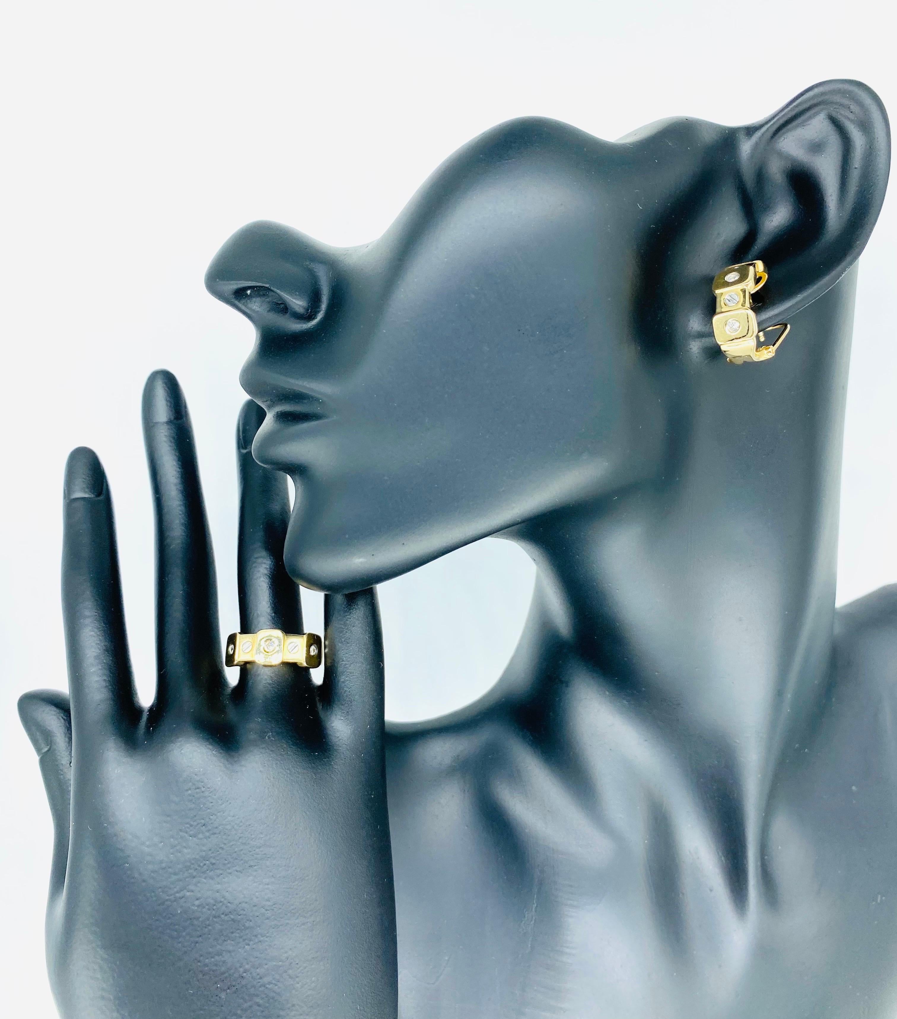 Vintage Designer 0.54 Carat Diamonds Bolts & Screws Design Earrings & Ring Set 14k Gold.
Beautiful set of both earrings with omega clip-on style back featuring both yellow gold and white gold with round diamonds totaling approx 0.54 carat. The