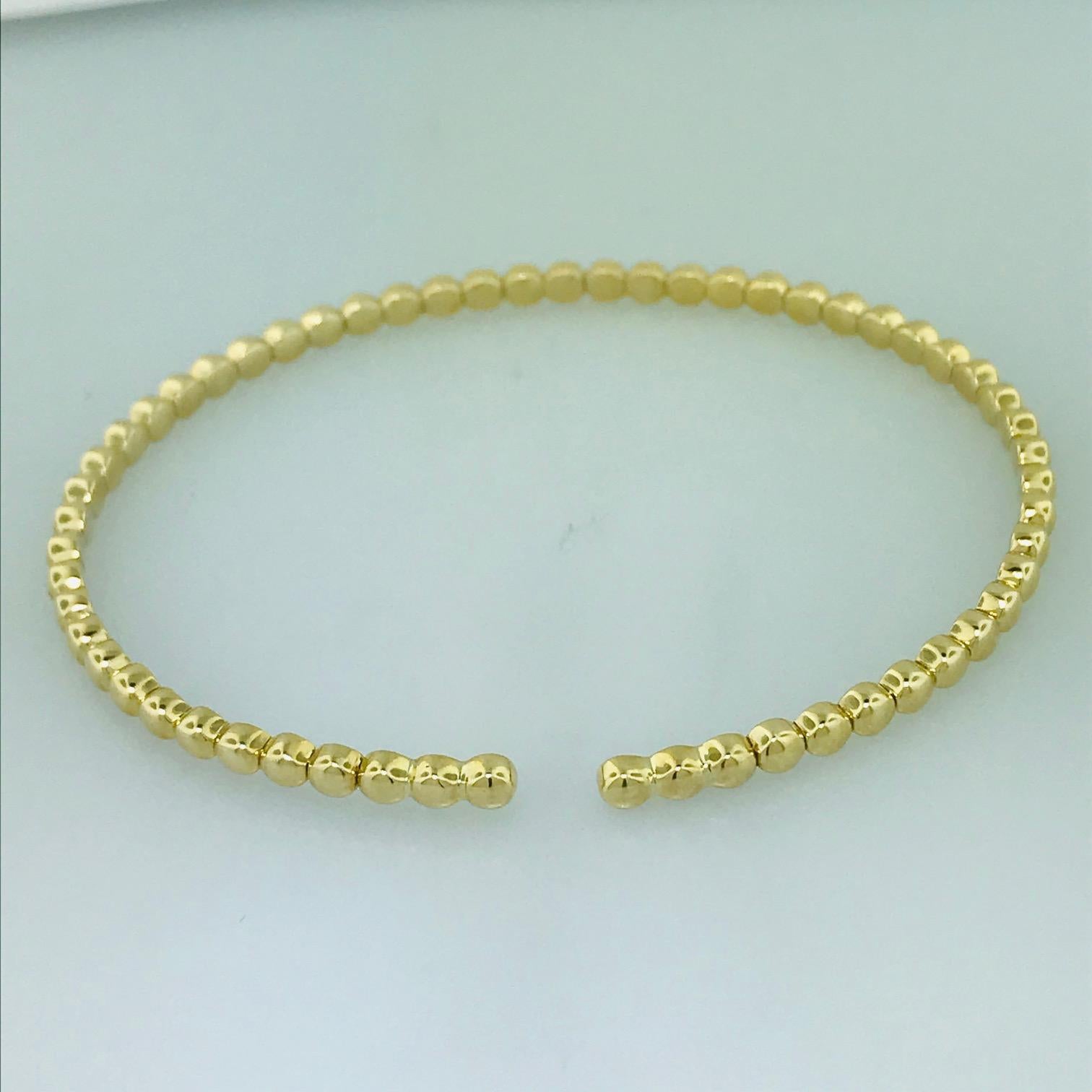 Designer 14 Karat Yellow Gold Flexible Bangle Bracelet, Collection Piece In New Condition In Austin, TX