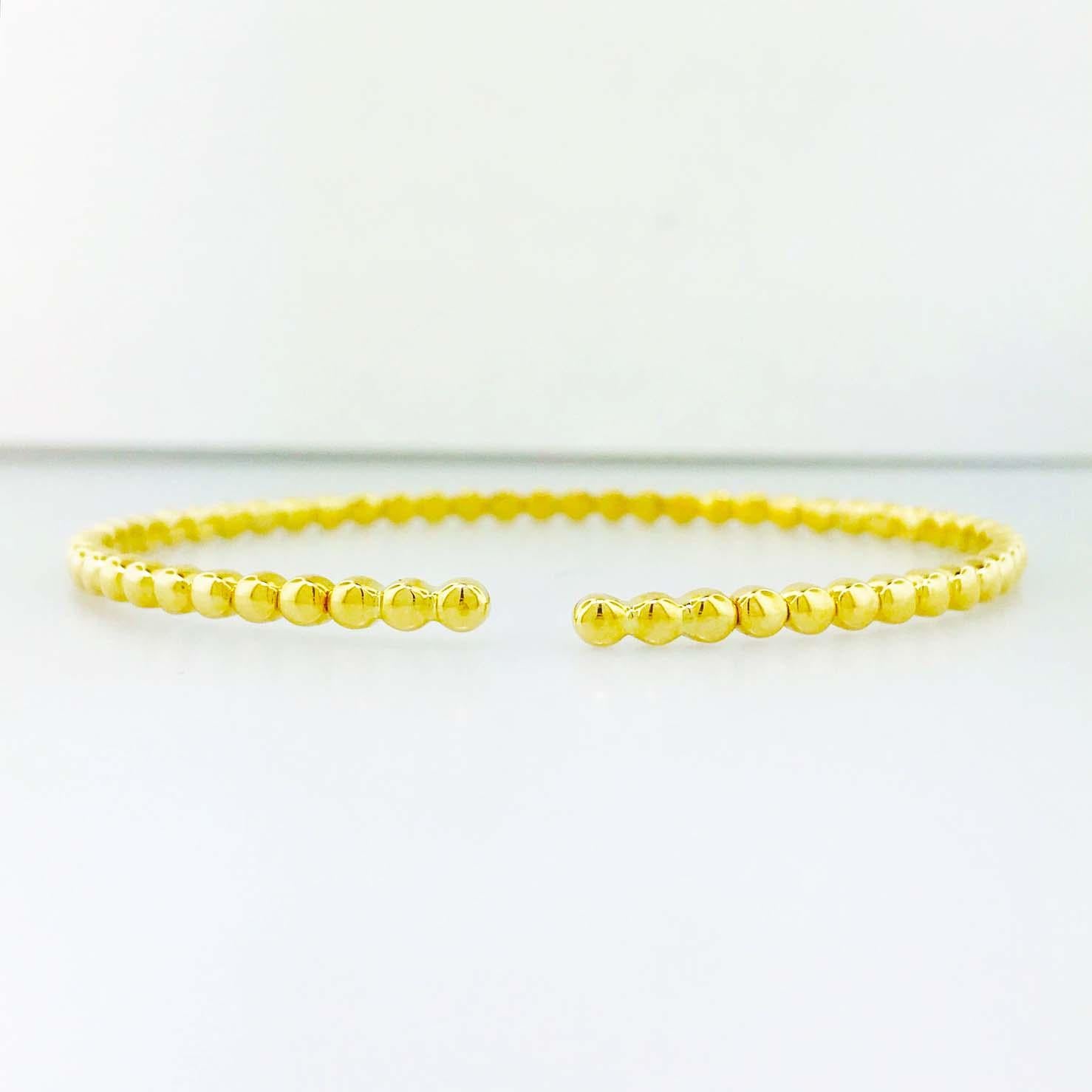 Designer 14 Karat Yellow Gold Flexible Bangle Bracelet, Collection Piece In New Condition In Austin, TX