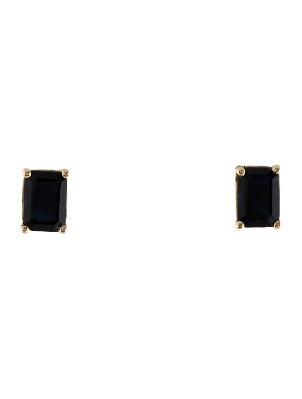 Indulge in timeless elegance with these stunning 14K Yellow Gold Sapphire Stud Earrings. Each earring features a mesmerizing 2.42 Carat Cut Cornered Rectangular Step Cut Sapphire, radiating sophistication and charm.

Specifications:

* Metal Type: