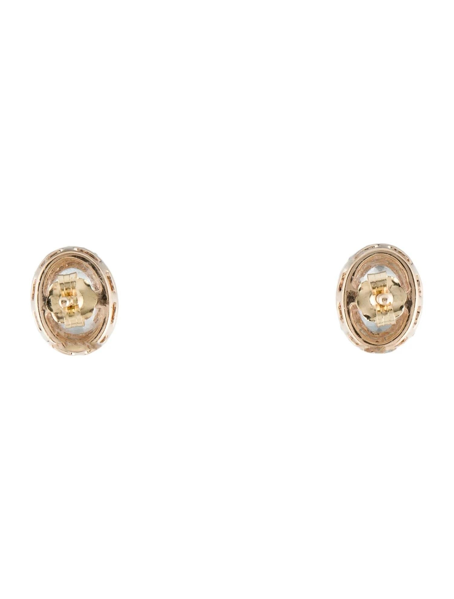 Enhance your jewelry collection with these stunning designer stud earrings crafted in 14K yellow gold, featuring beautiful oval aquamarines and sparkling diamonds.

Specifications:

* SKU: BHER-150AQD
* Stock ID: EARRI276452
* Material: 14K Yellow