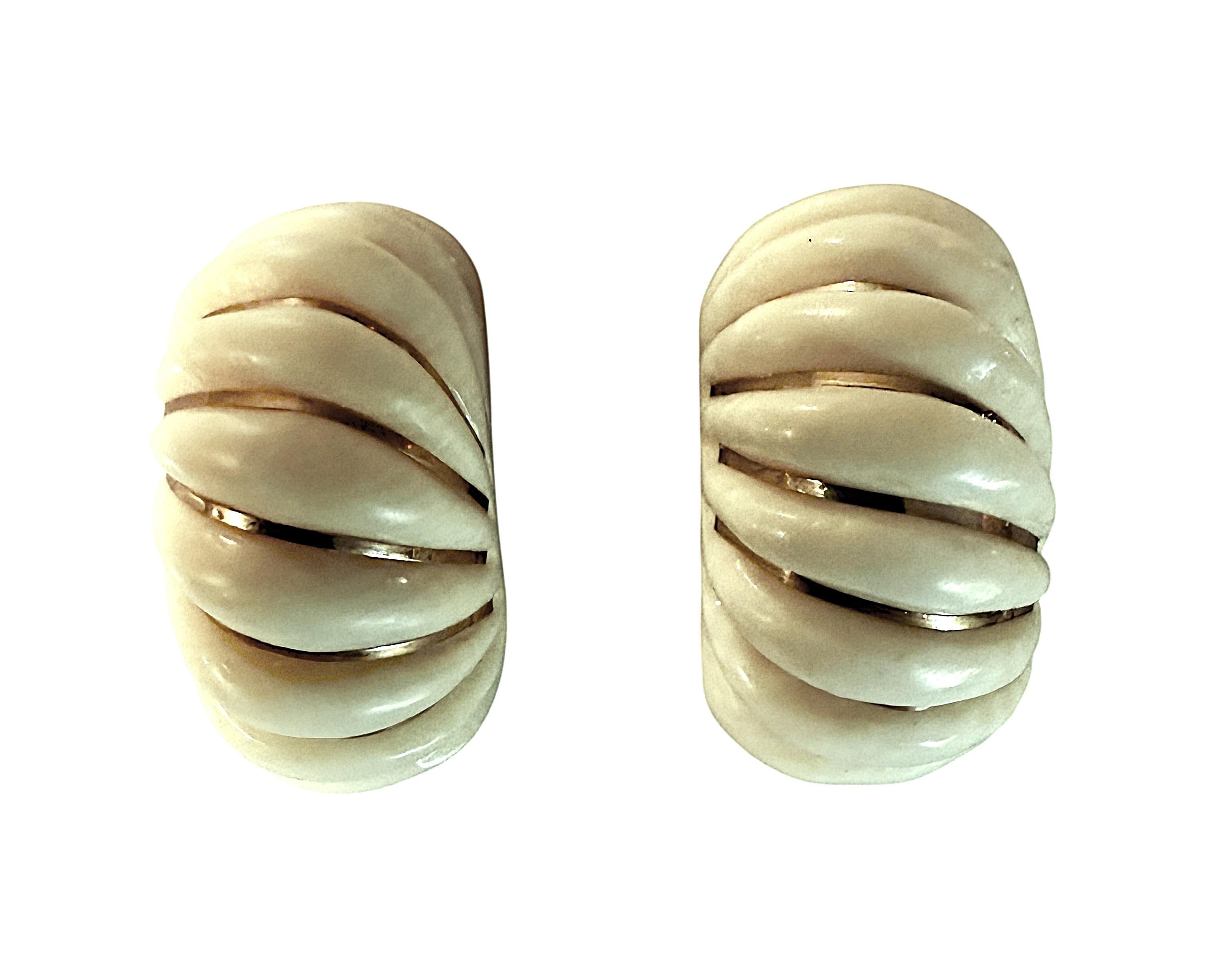 These are really cool earrings.  The earrings are a bombe style dome ring in a ribbed design defined with inlaid strips of 14k yellow gold stamped 