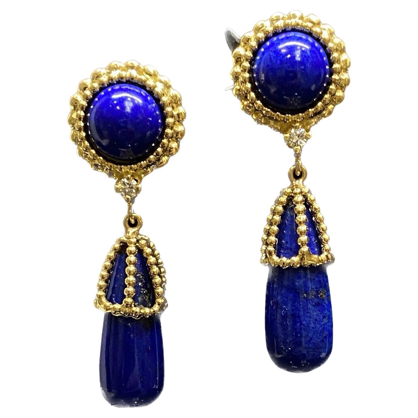 Simply Beautiful Vintage Mid Century Designer Earrings from the Italian house Cellino. Vibrant and natural undyed blue lapis lazuli drops set in beaded cage tops suspend from round cabochons framed in beaded gold and accented with a sparkling