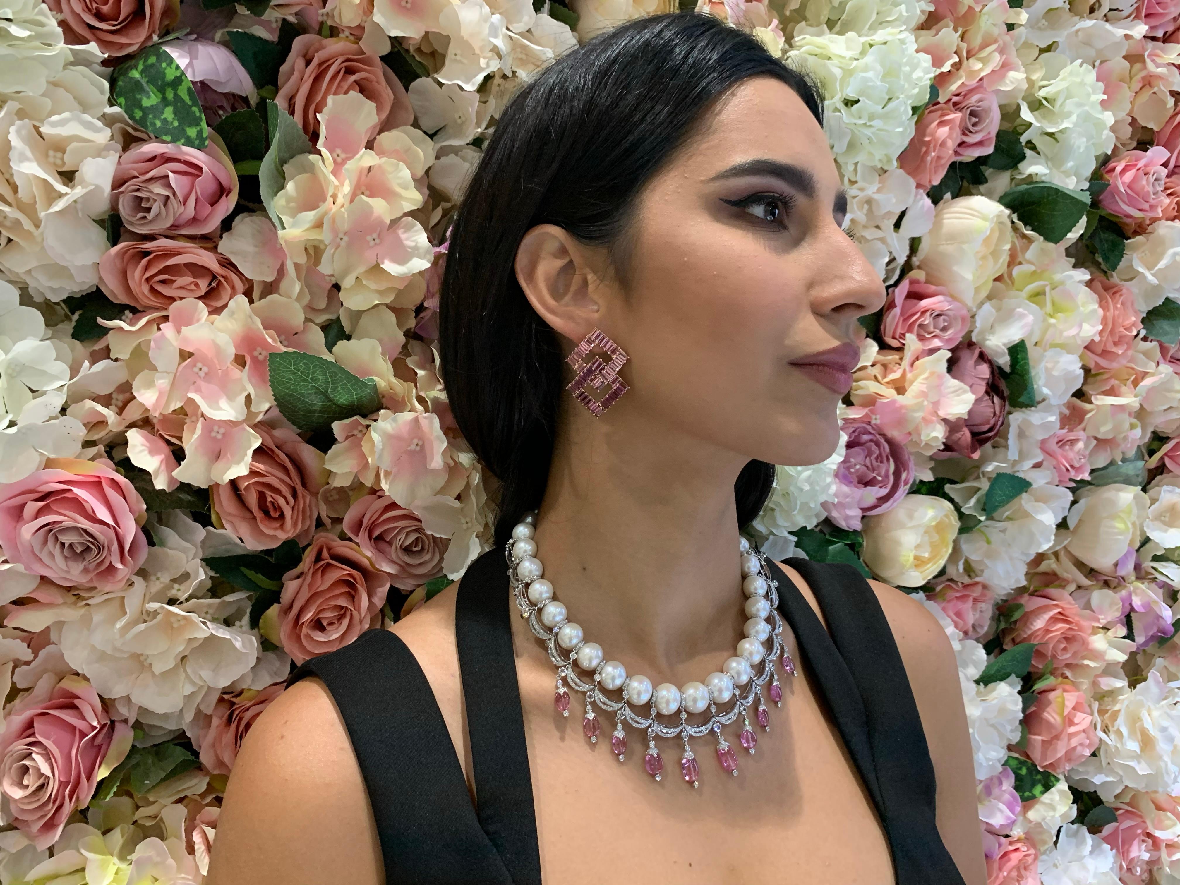 Sunita Nahata presents an exclusive designer earring adorned with the best pink tourmalines. The unique baguette cut on these gemstones make them one of a kind. But what makes this piece so special is the slight curvature of the geometric earring