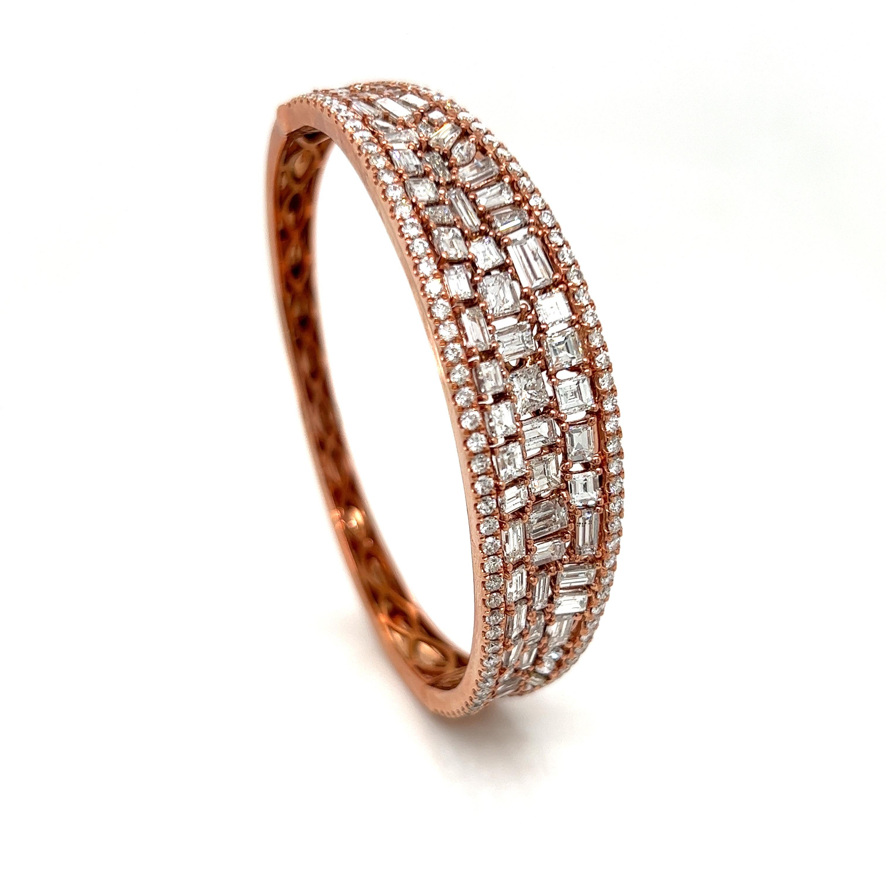 Exquisite designer diamond bangle.  Asscher, round, baguette and princess cut diamonds are expertly crafted into this bangle.  A total of 9.20 cttw in VS-SI clarity and G-H color diamonds in 18K Rose Gold.  185 diamonds make this unique bangle