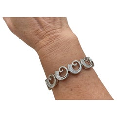 Bracelet en or blanc 14Kt avec tourbillon de diamants AV 2.84 cttw