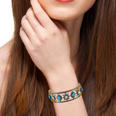 Designer Bangle with Diamond and Turquoise Surrounded by Pave Diamonds