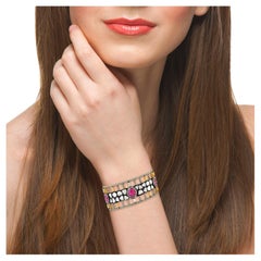 Designer Bangle with Ruby and Sapphire Set Surrounded by Pave Diamonds