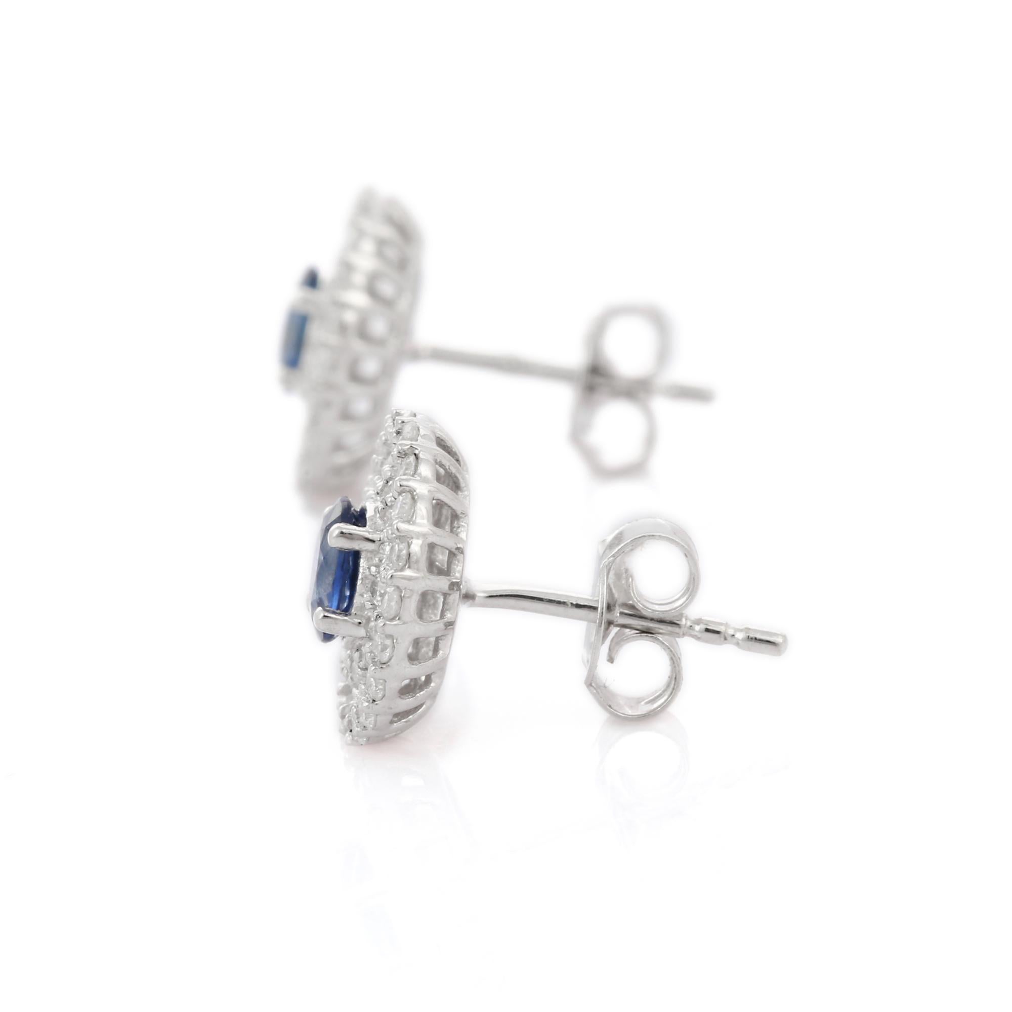 Donna Orecchini firmati con zaffiro blu e diamanti a raggiera in oro bianco 14 carati in vendita