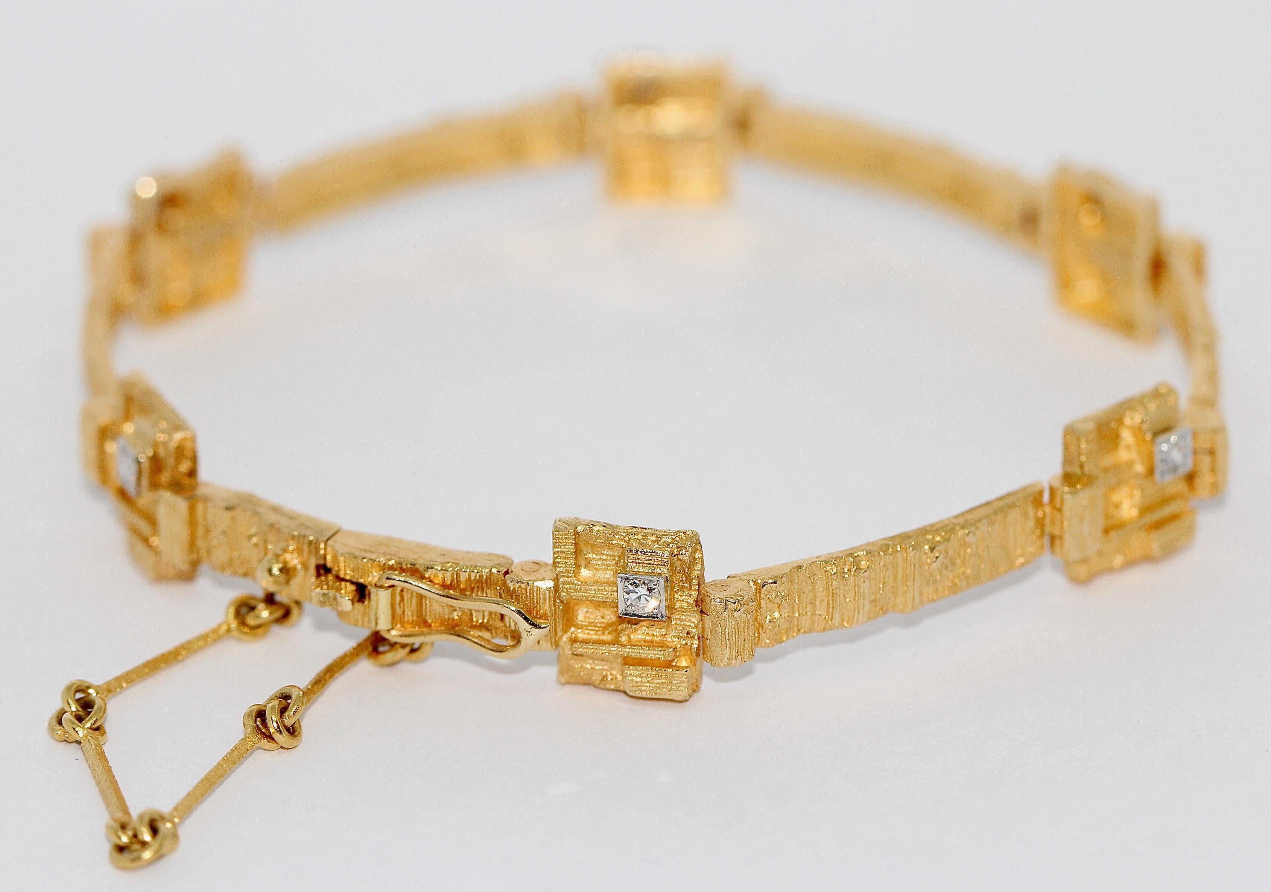 Designer Bracelet by Lapponia, 18 Karat yellow gold with six diamonds.

Weight: 15.4 Grams.

Including certificate of authenticity.