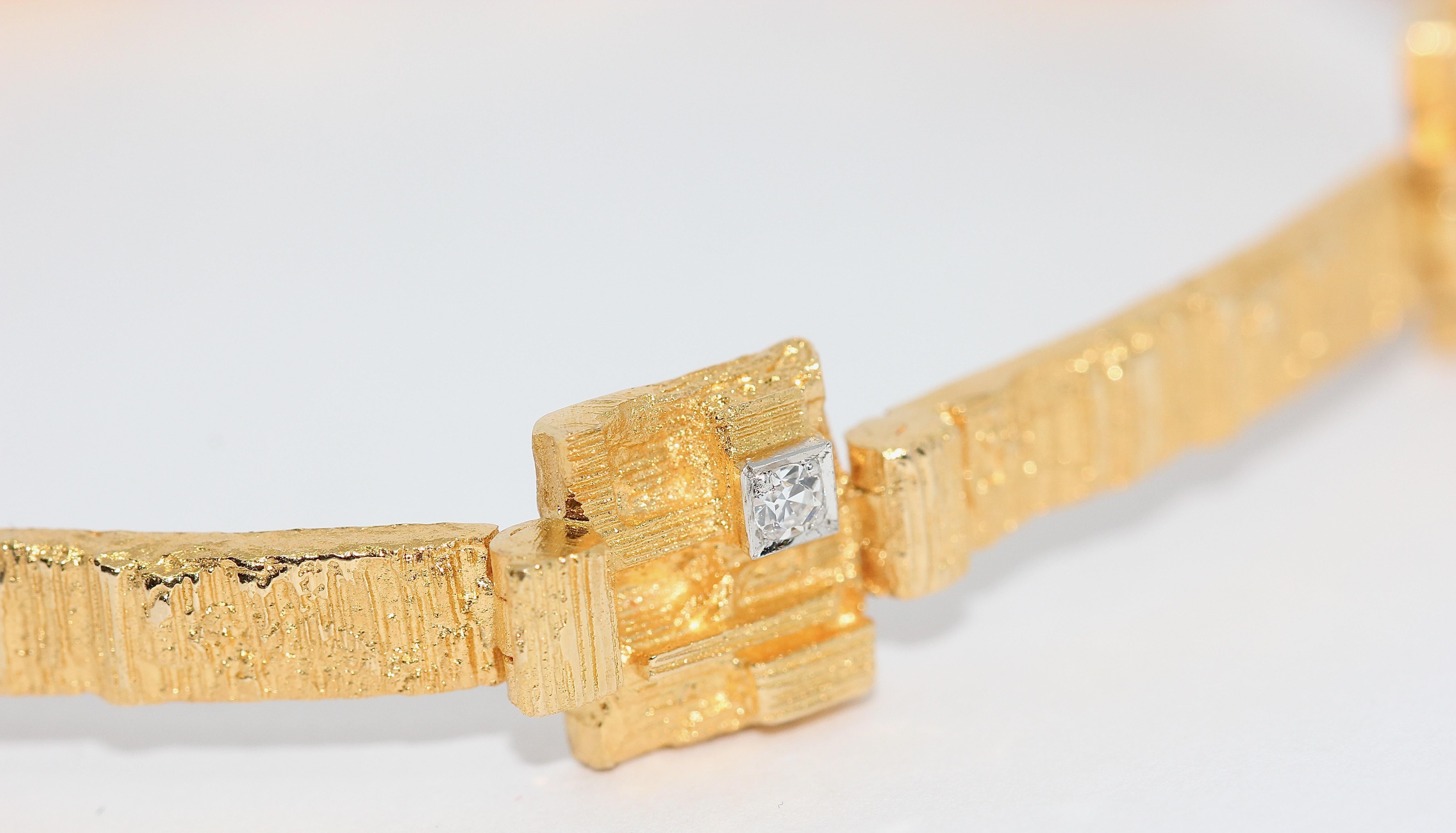 gold designer bracelet