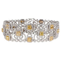 Bracelet de créateur avec des diamants jaunes fantaisie taille coussin.  D17.73ct.t.w.