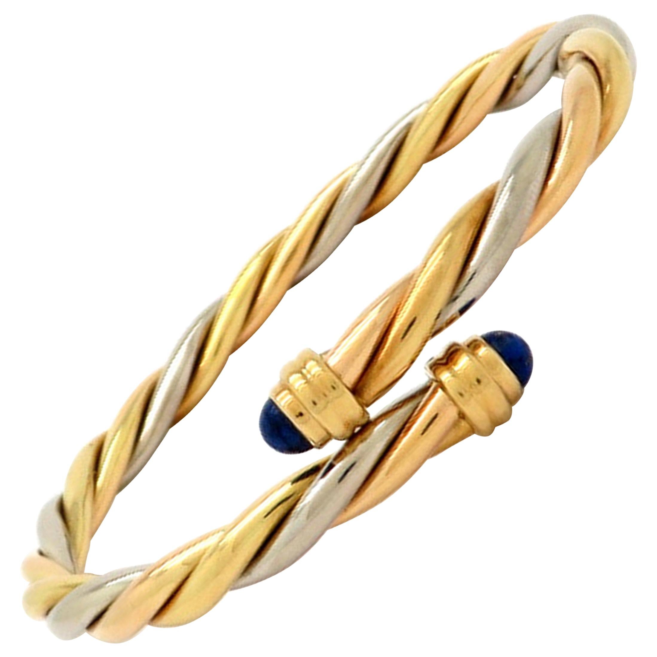 Designer Cartier 18 Karat Gold Lapis Lazuli Twisted Bypass Cuff Bangle Bracelet