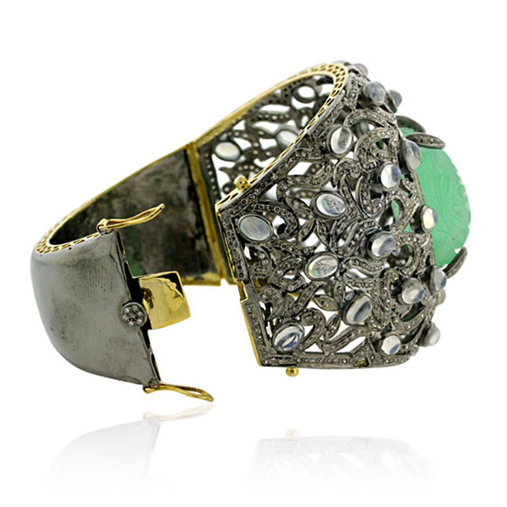 Modern Carved Emerald Center On Floral Pave Diamond And Blue Moonstone Cuff For Sale