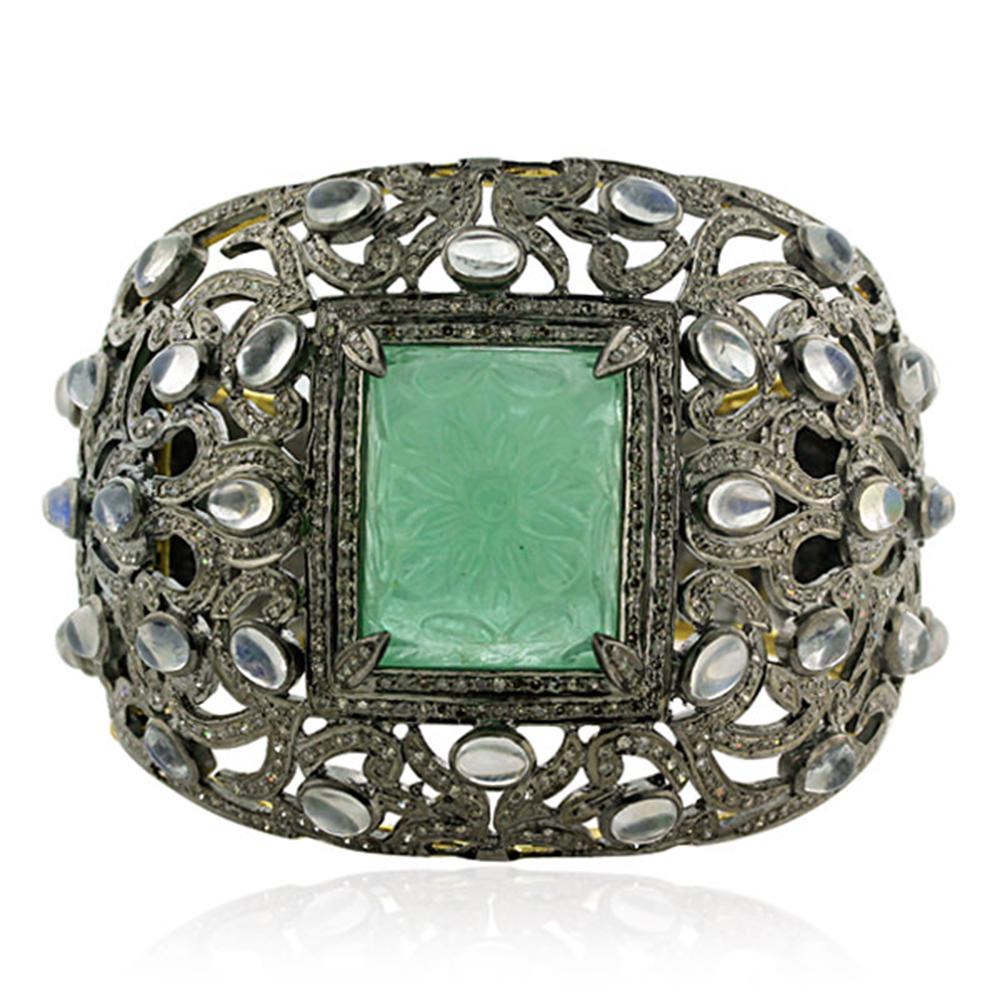 Mixed Cut Carved Emerald Center On Floral Pave Diamond And Blue Moonstone Cuff For Sale