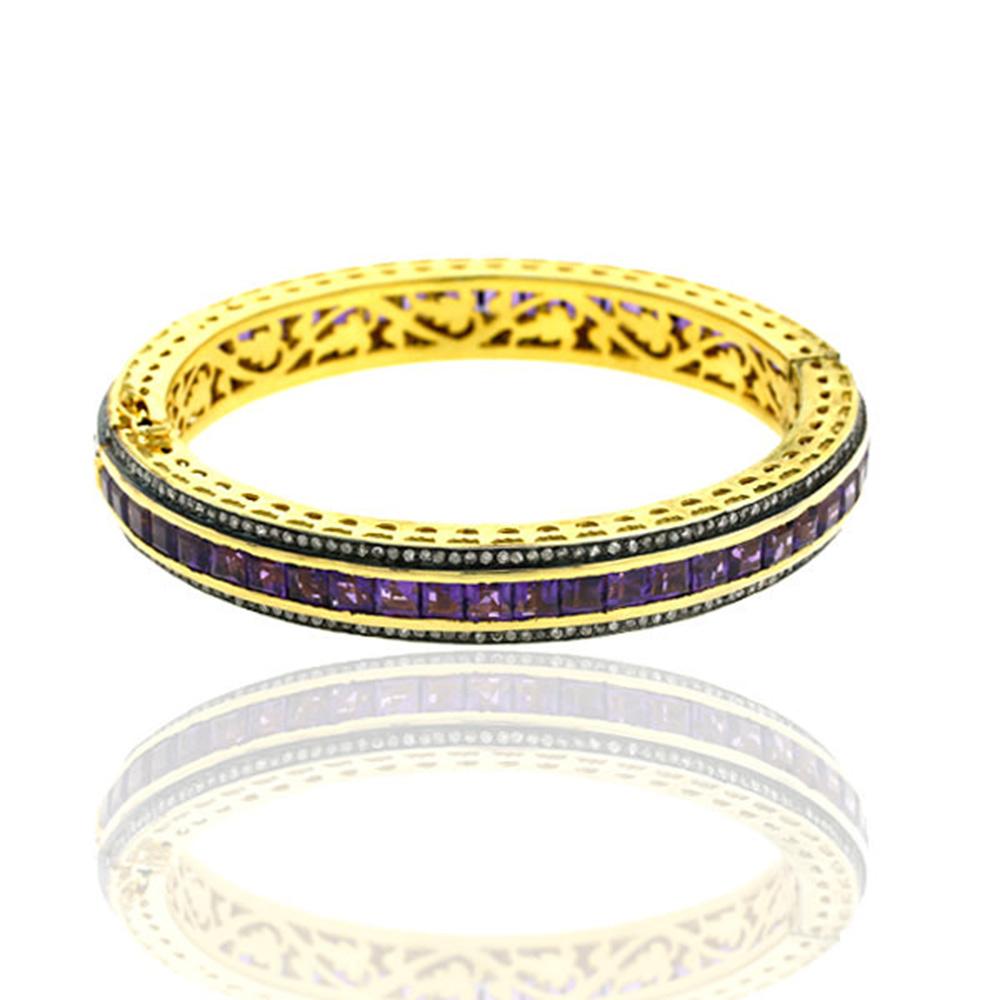 Modern Channel Set Amethyst Bangle in 14k Gold With Diamond Borders For Sale