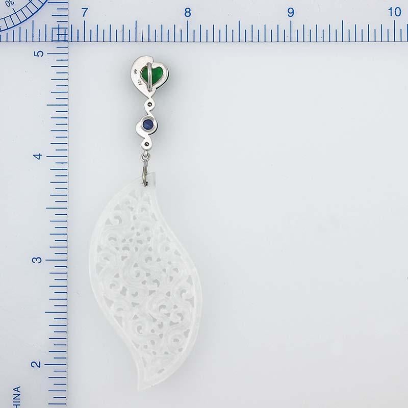 What an amazing Mason-Kay Jade Designer Pendant AND Make sure you see the matching earrings!

This original design pendant features a three dimensional icy white jadeite jade curved marquise shaped carving set in 14K white gold with an exquisite top