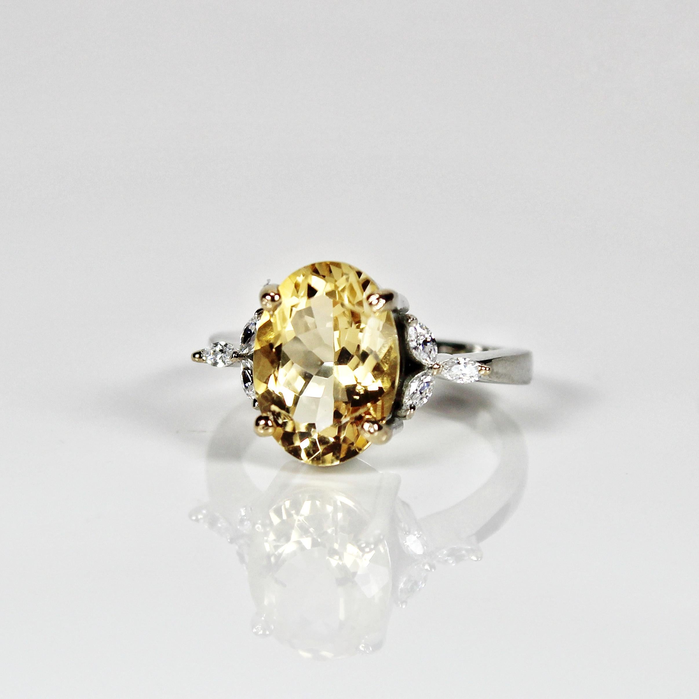 Metal - Silver
Indian ring size - 11
Product gross Weight - 4.130 Grams
Gemstone - Natural Citrine
Stone weight - 3.45 Carat
Stone shape - Oval
Stone size - 12 x 8 mm
Diamonds - Swarovski

Elegant designer ring made in silver with beautiful natural