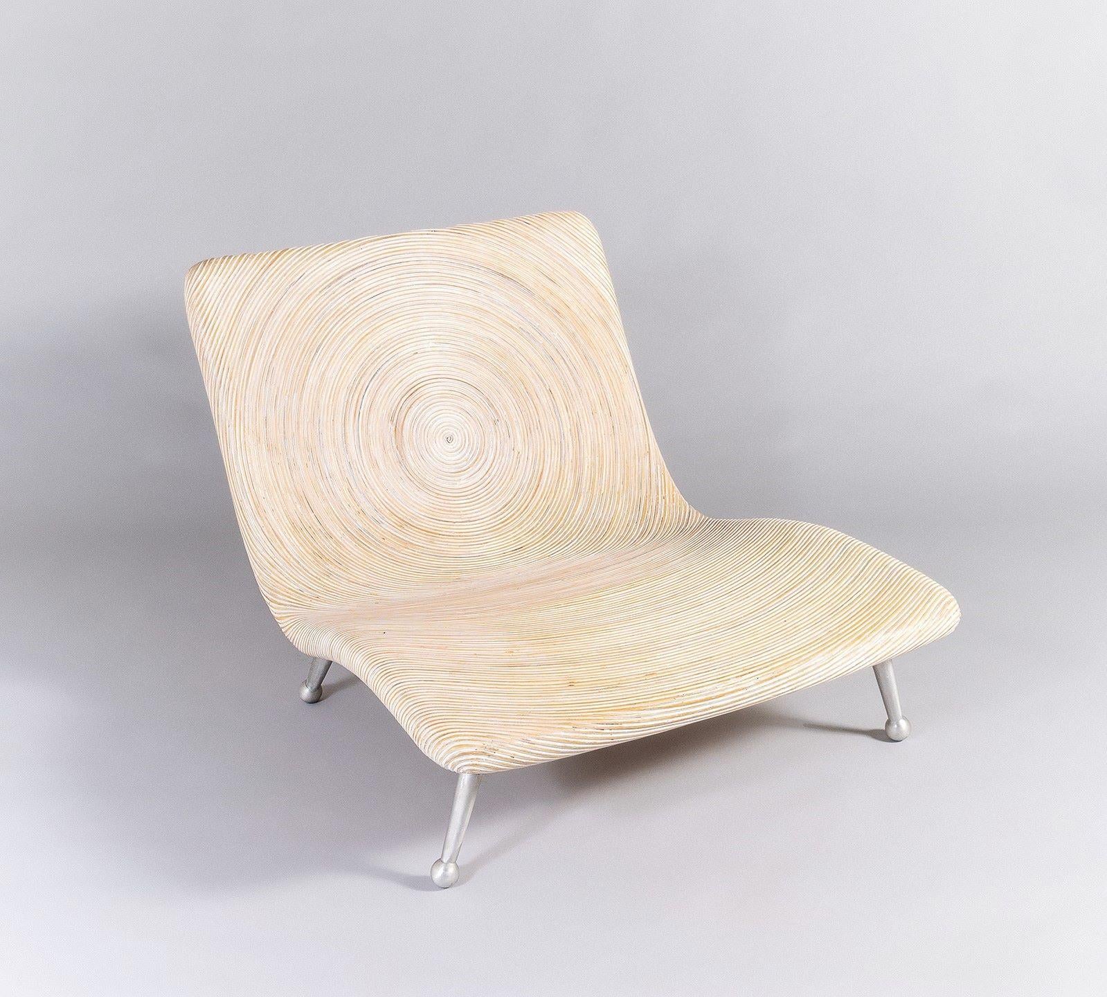 A low lounge chair designed by the famous Filipino designer Clayton Tugonon for Snug, the ‘Coconut’ chair is made from sustainably sourced eco friendly materials.
A  very stylish, unique design, made from salvaged coconut stems, sea shells and