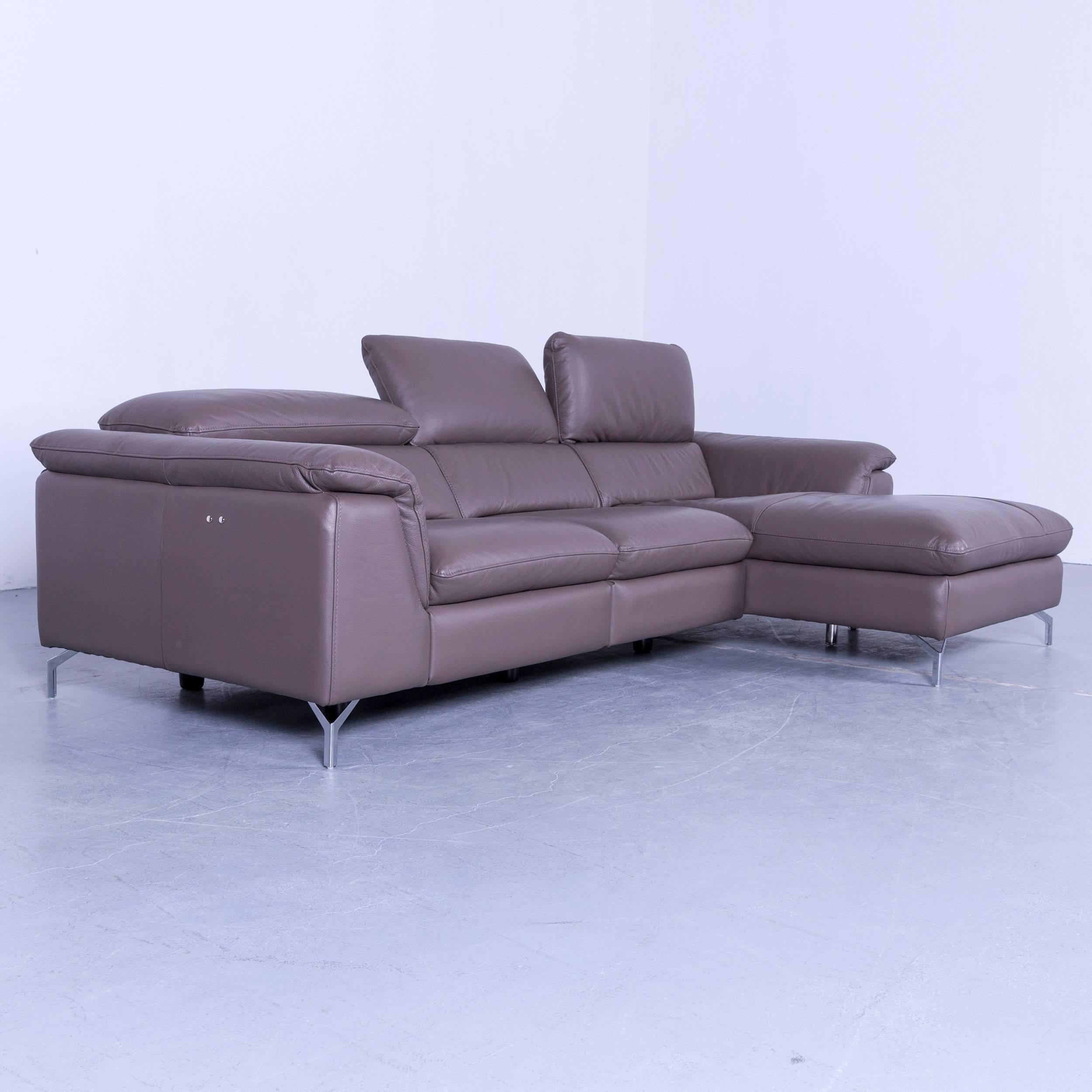 Designer corner sofa grey brown taupe leather with electric recliner functions, made for pure comfort and flexibility.