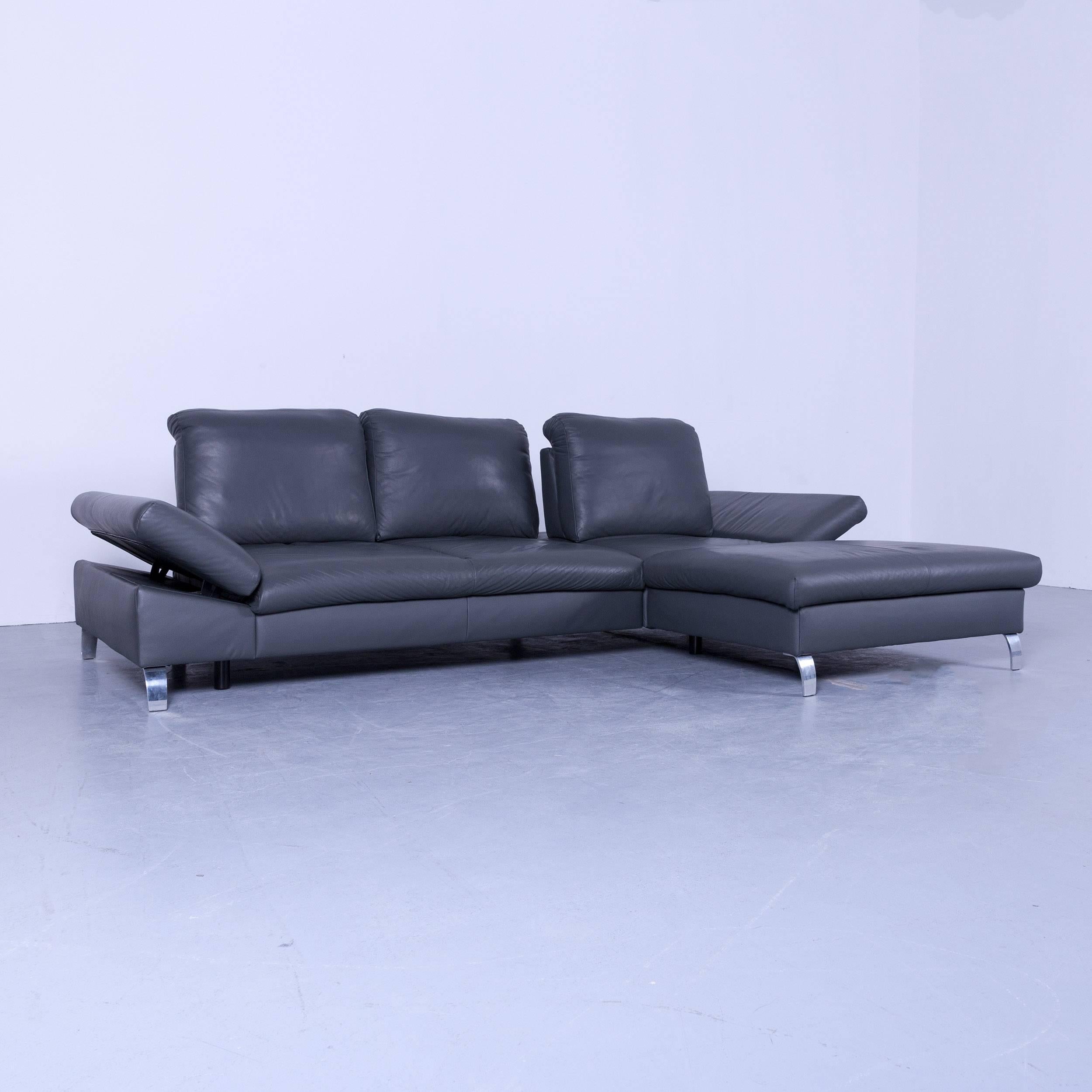 Designer corner sofa leather grey function couch modern, in a minimalistic and modern design, with convenient functions, made for pure comfort.